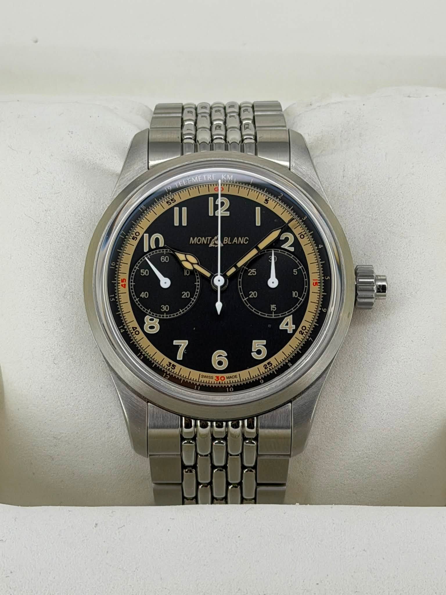 May be an image of wrist watch and text