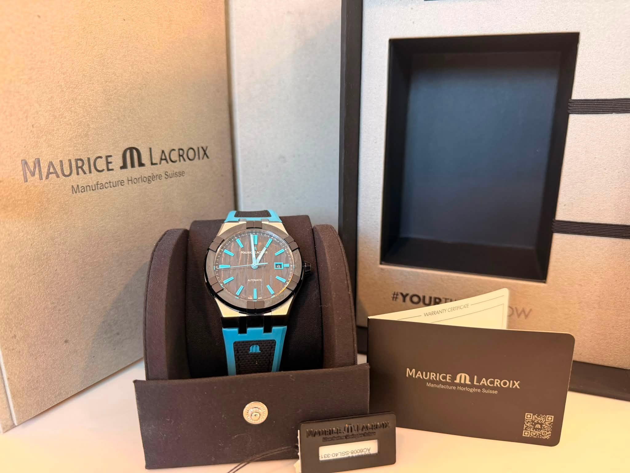 May be an image of wrist watch and text