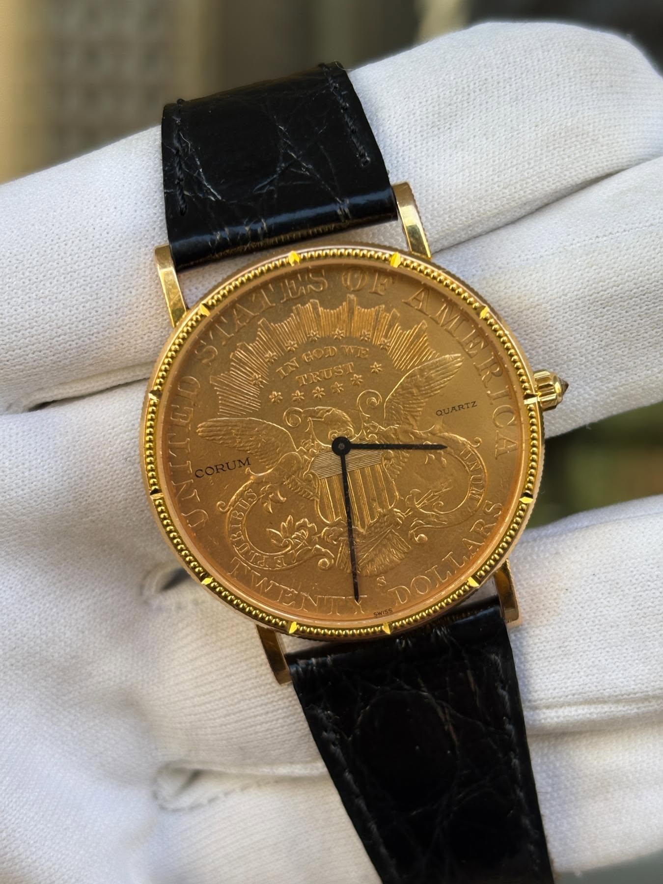 May be an image of wrist watch and text
