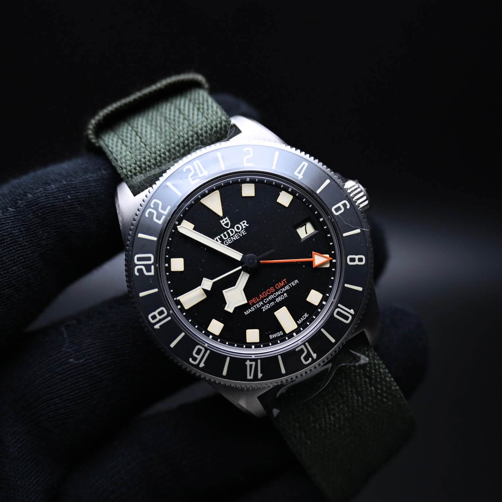 May be an image of wrist watch and text