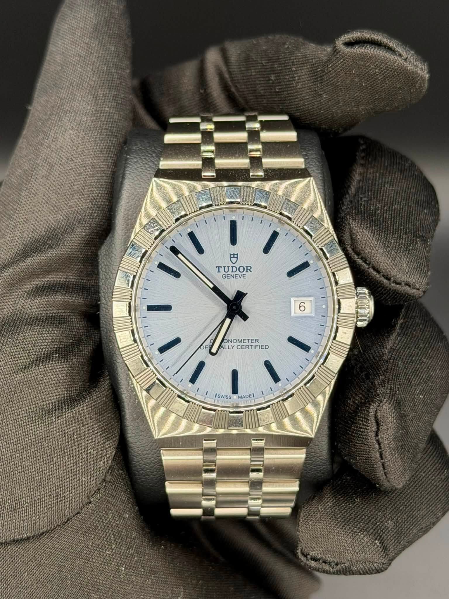 May be an image of wrist watch and text