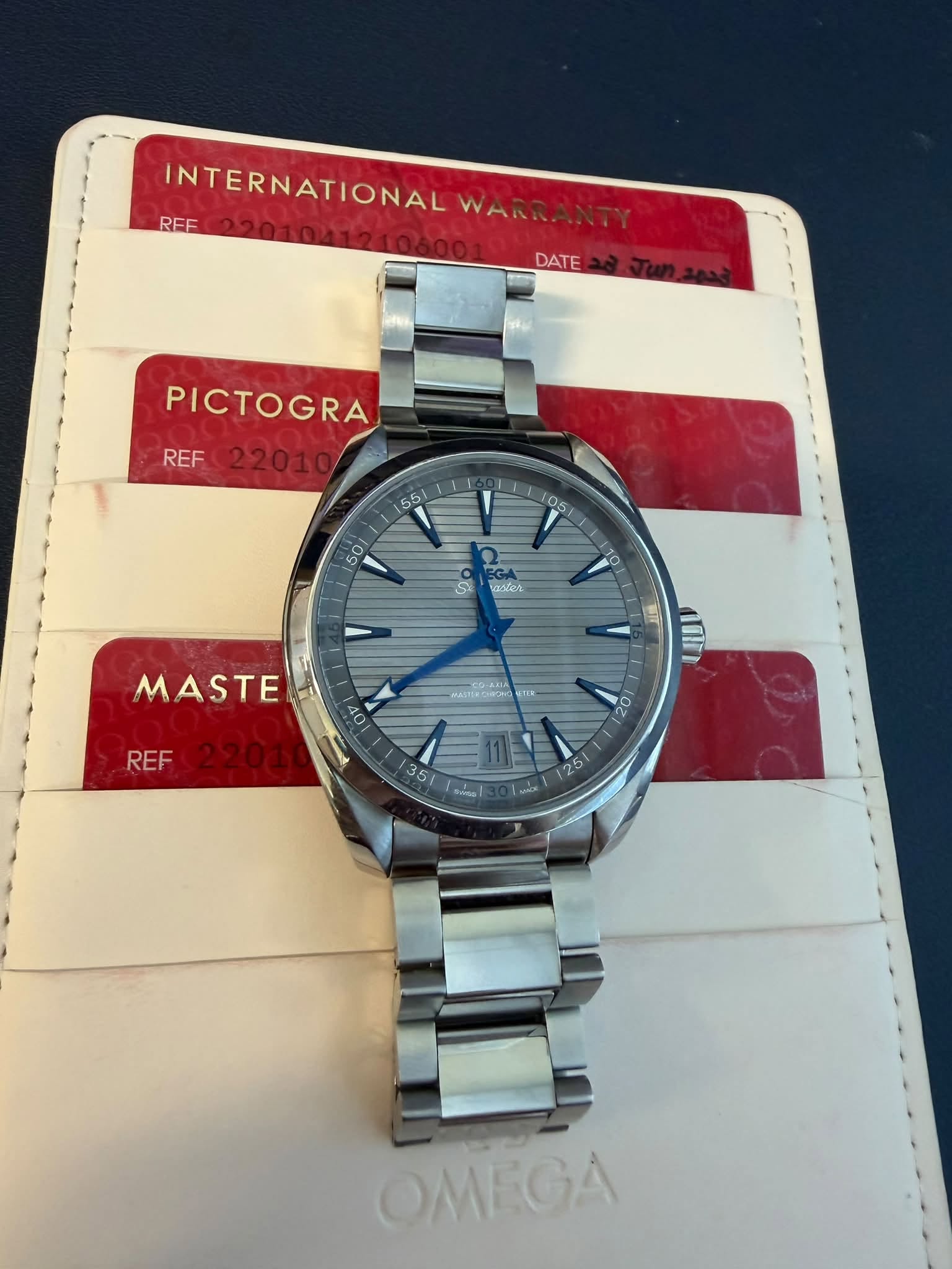 May be an image of wrist watch and text