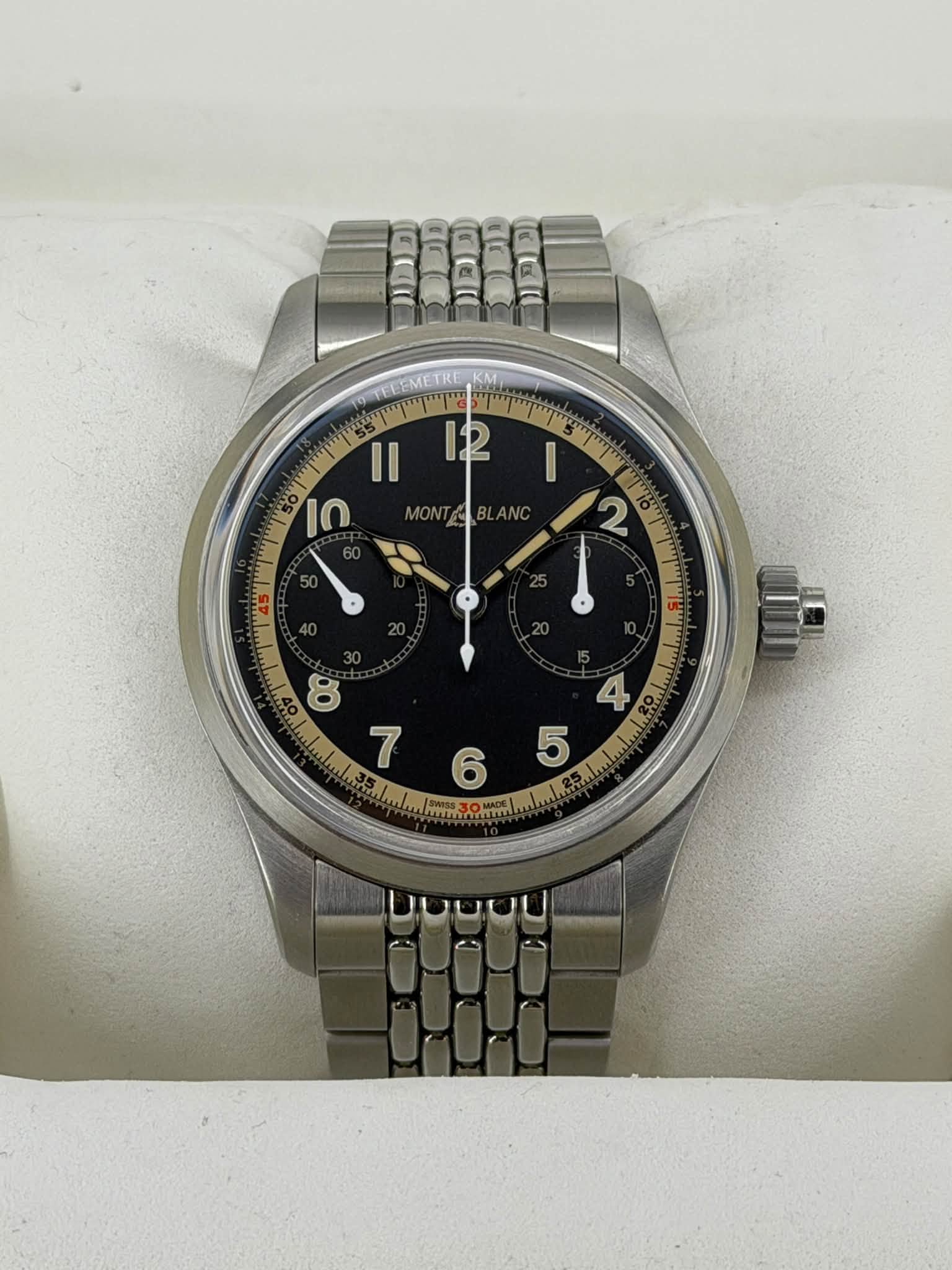 May be an image of wrist watch and text