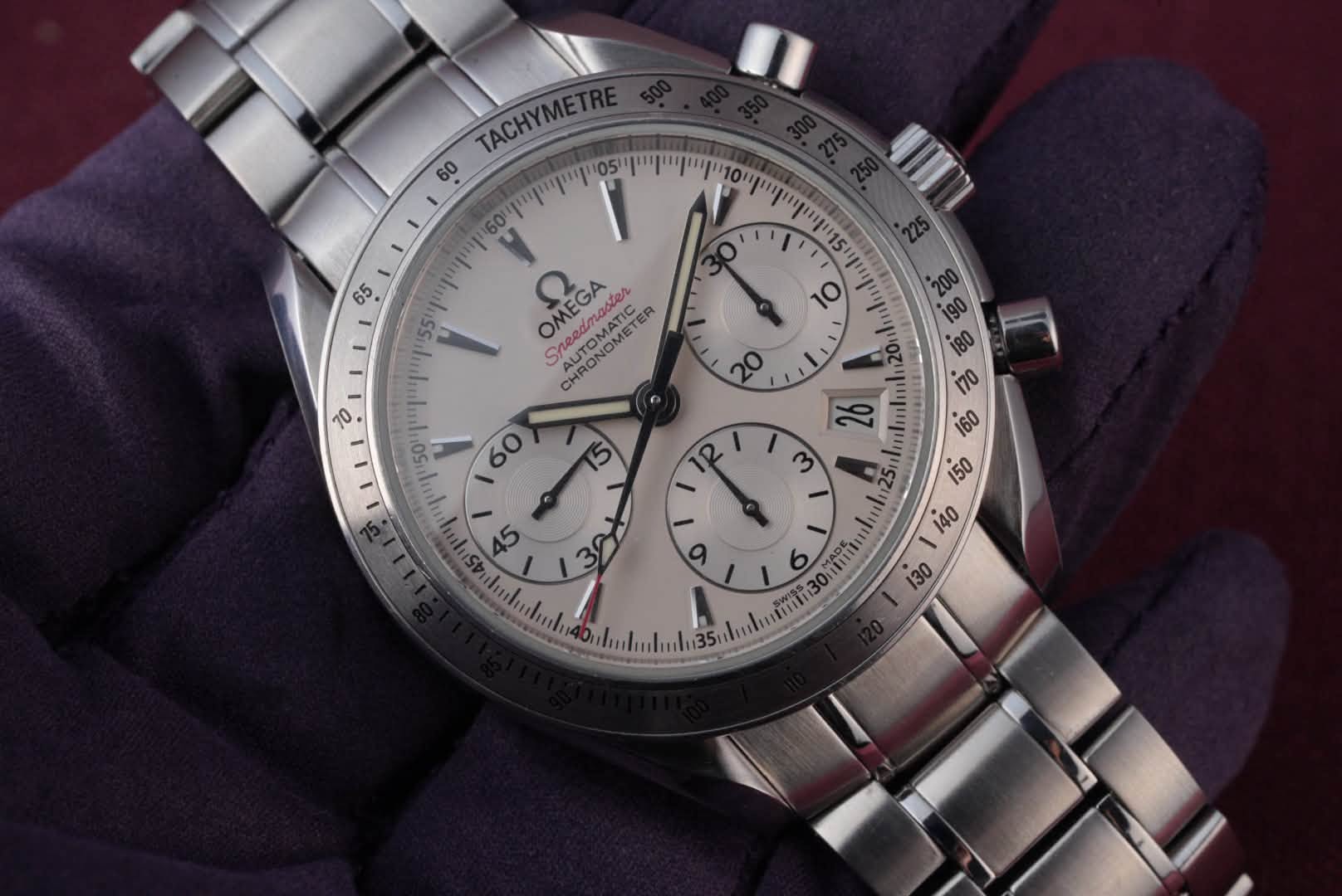 May be an image of wrist watch and text that says '65 O ' 55 I O 0 TACHYMETRE TACHYMET 60 y 2 O Sn CHRON Sheeamane Sreadmabier PUDONOMETER ACAT ey CHRONOMETE MATC CHRONOMETER…