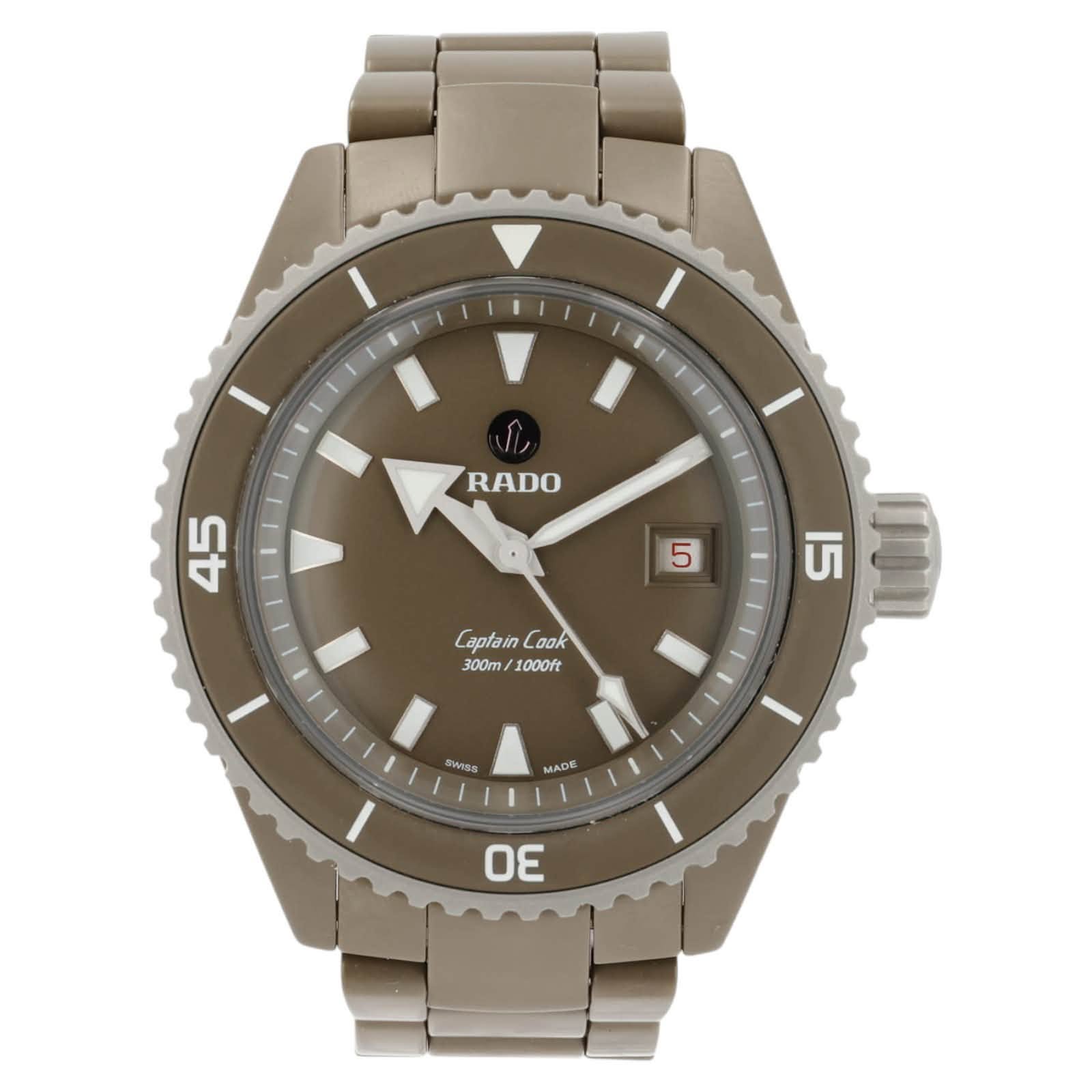 May be an image of wrist watch and text that says 'RADO I 45 5 15 Captain CaptainCoak ook 300m 1000ft MSS MADE DE'