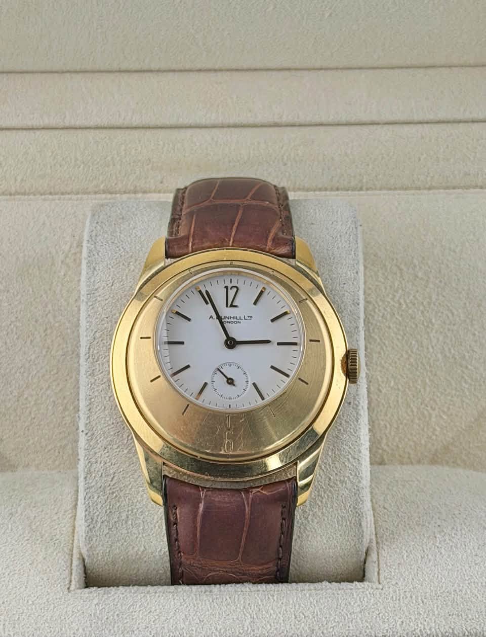 May be an image of wrist watch and text