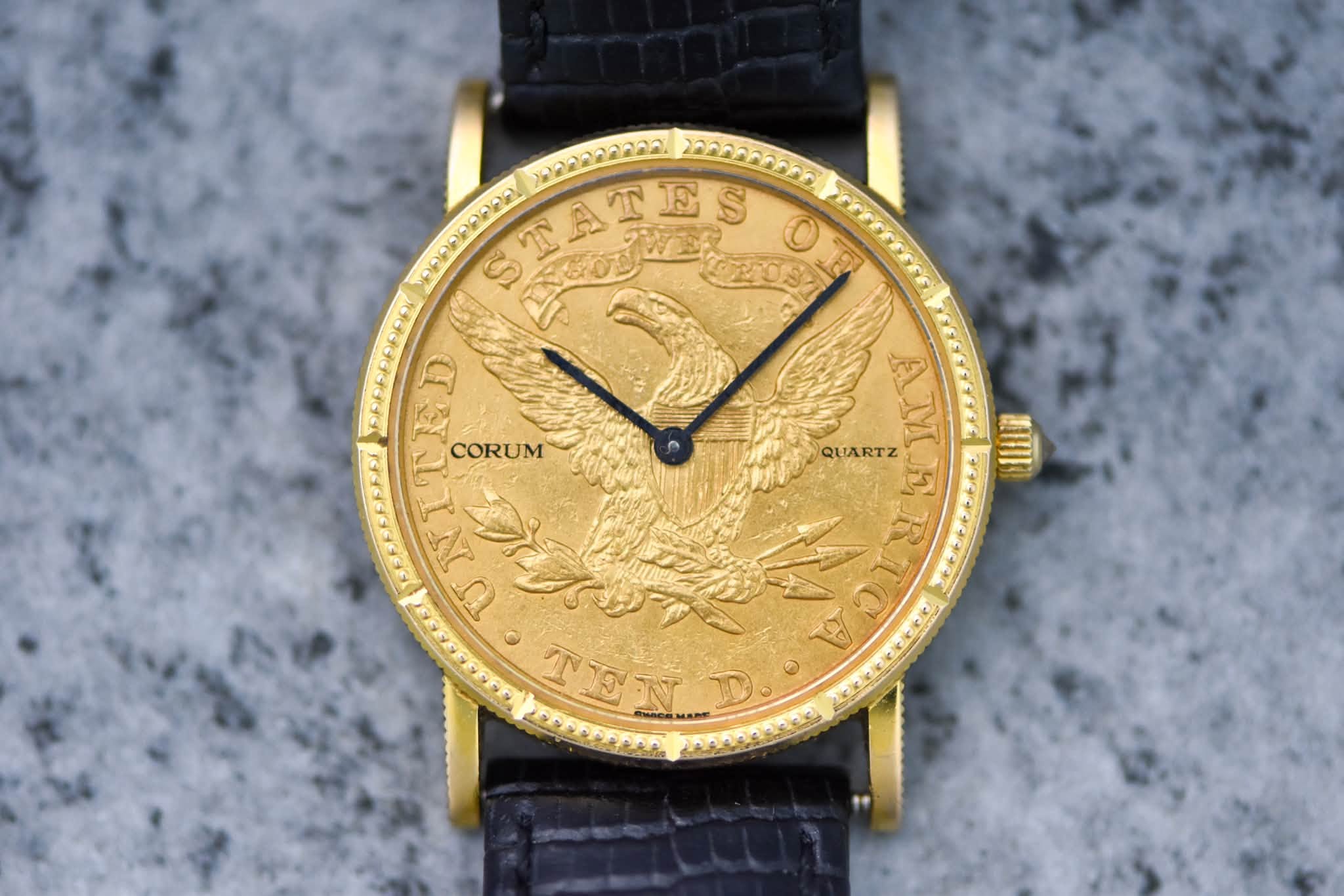 May be an image of wrist watch and text