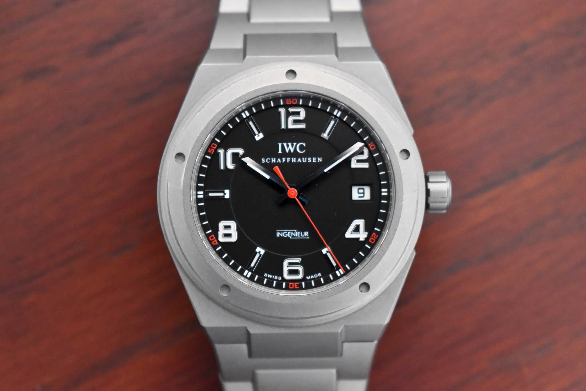May be an image of wrist watch and text that says '! 12 ገር IWC SCHAPPHAUSEN O0 8 INGENIE i 6 - ADE SWISE DE E I'