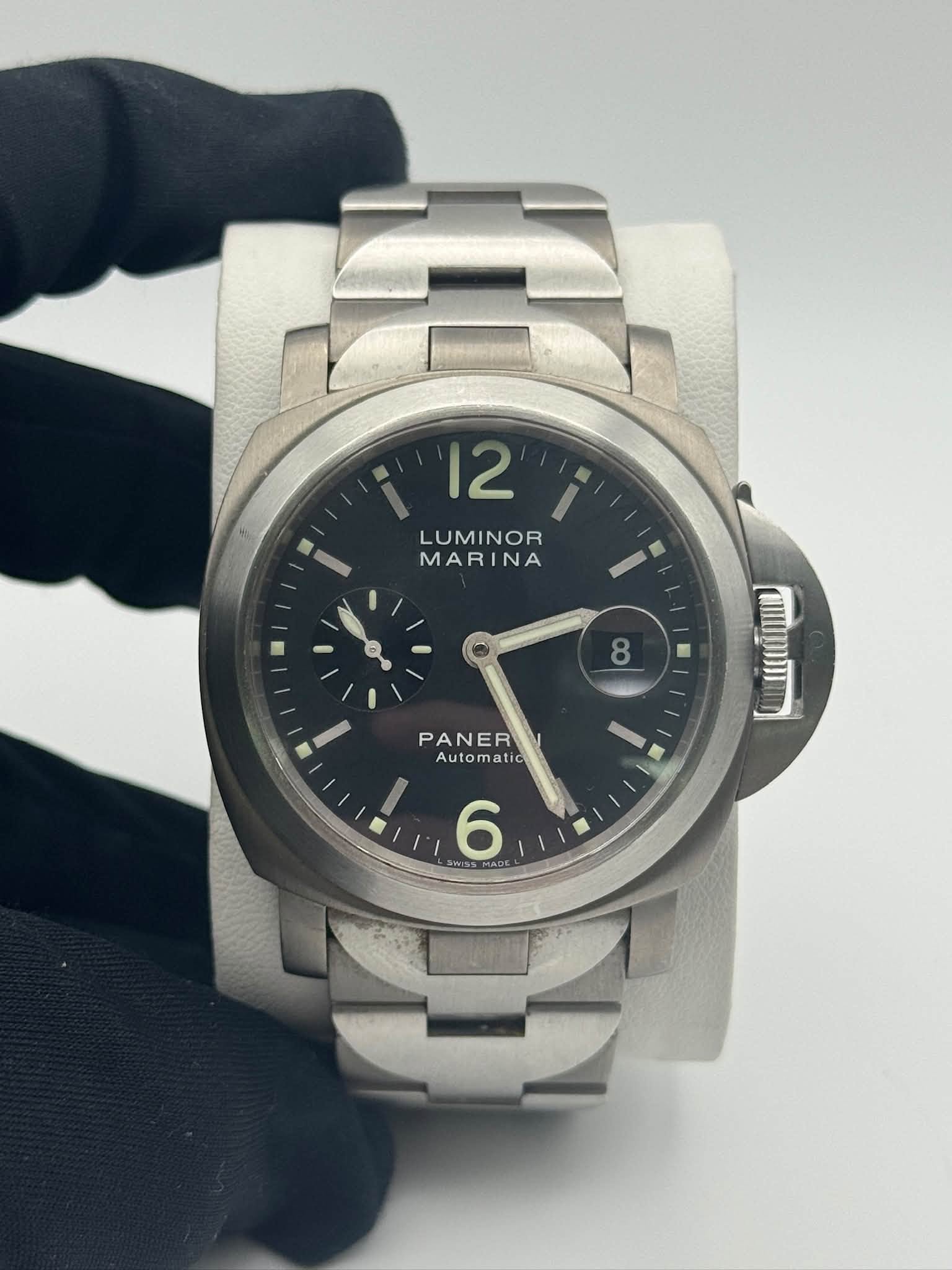 May be an image of wrist watch and text
