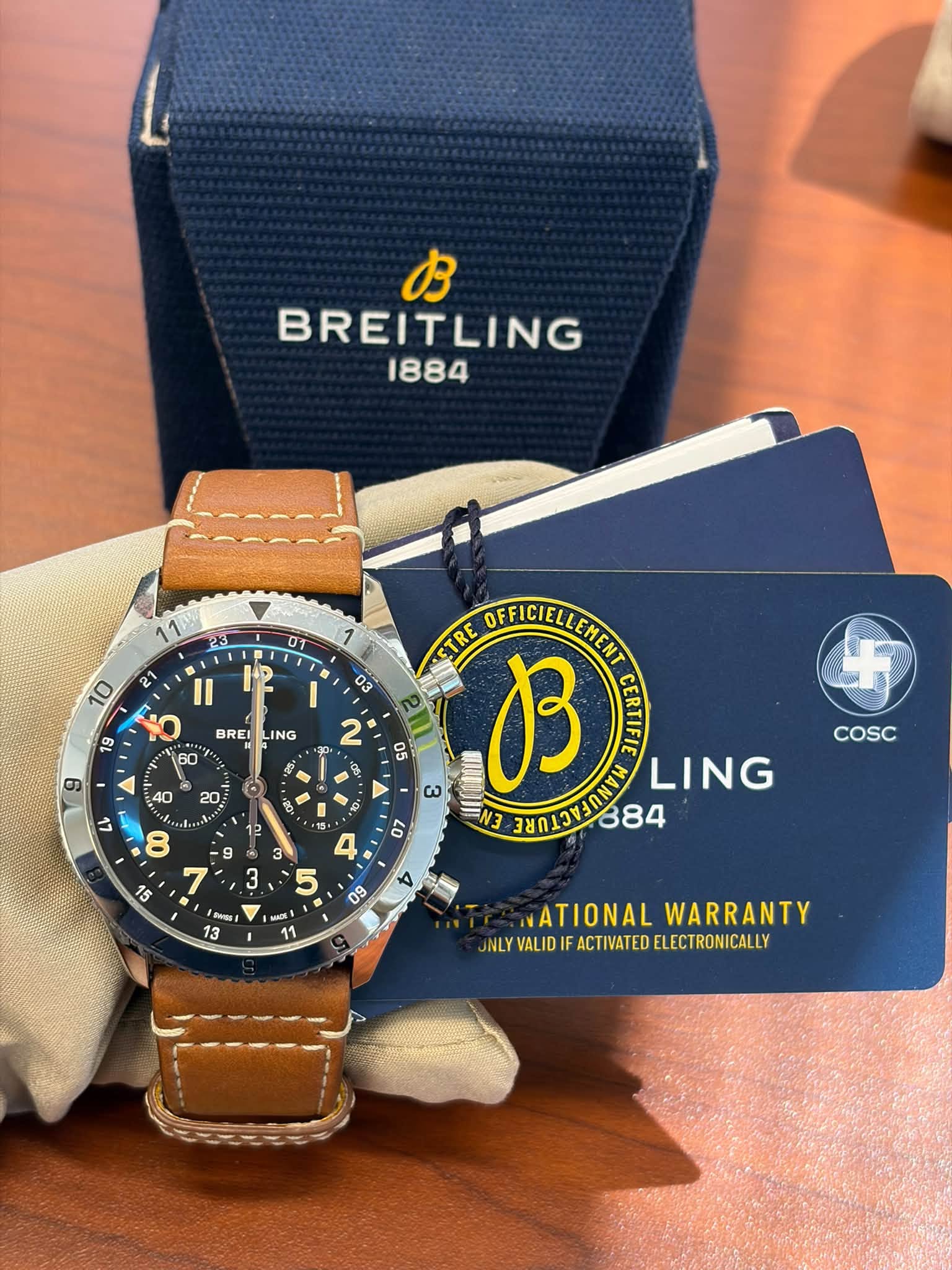 May be an image of wrist watch and text