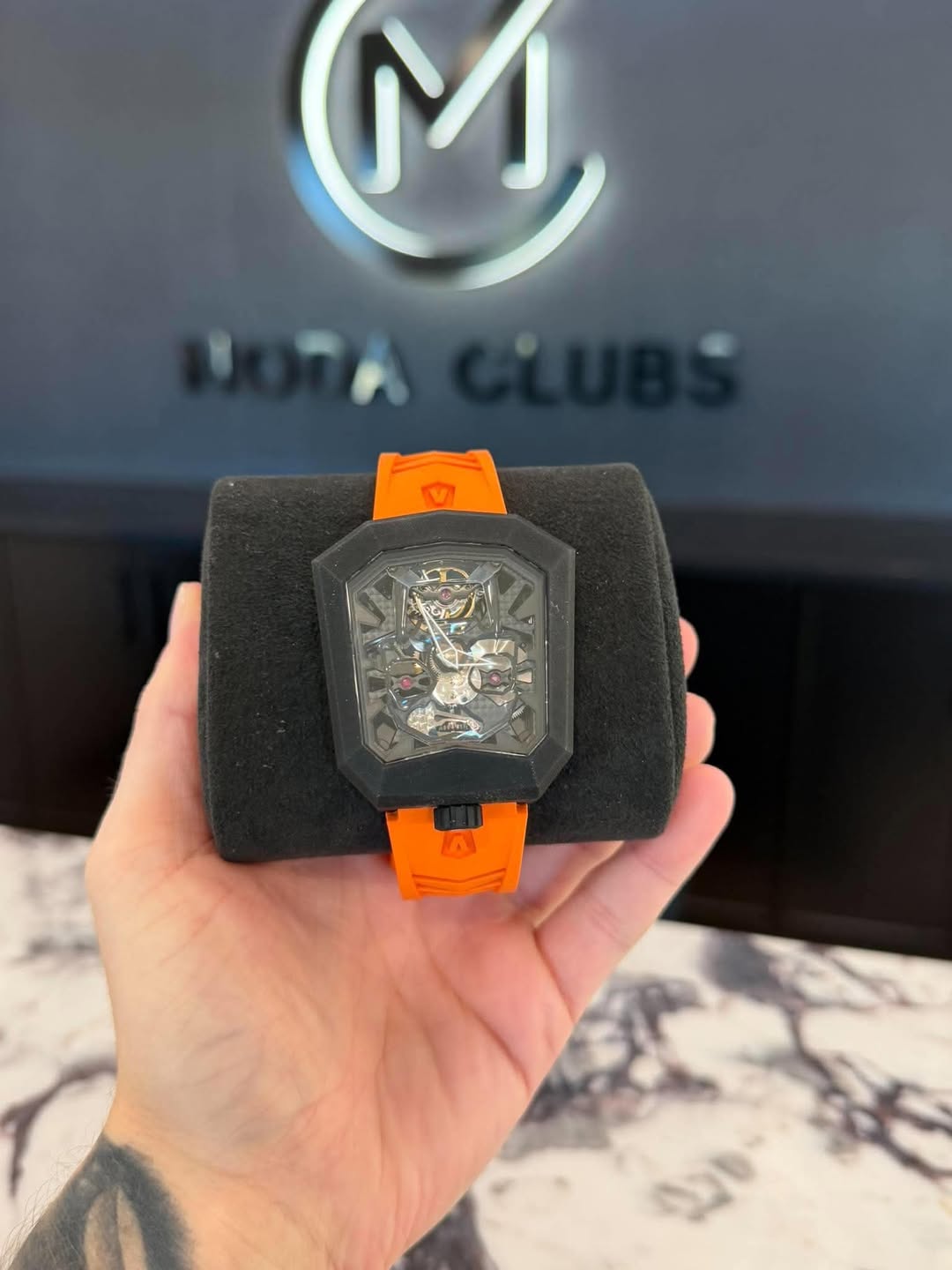 May be an image of digital watch and text