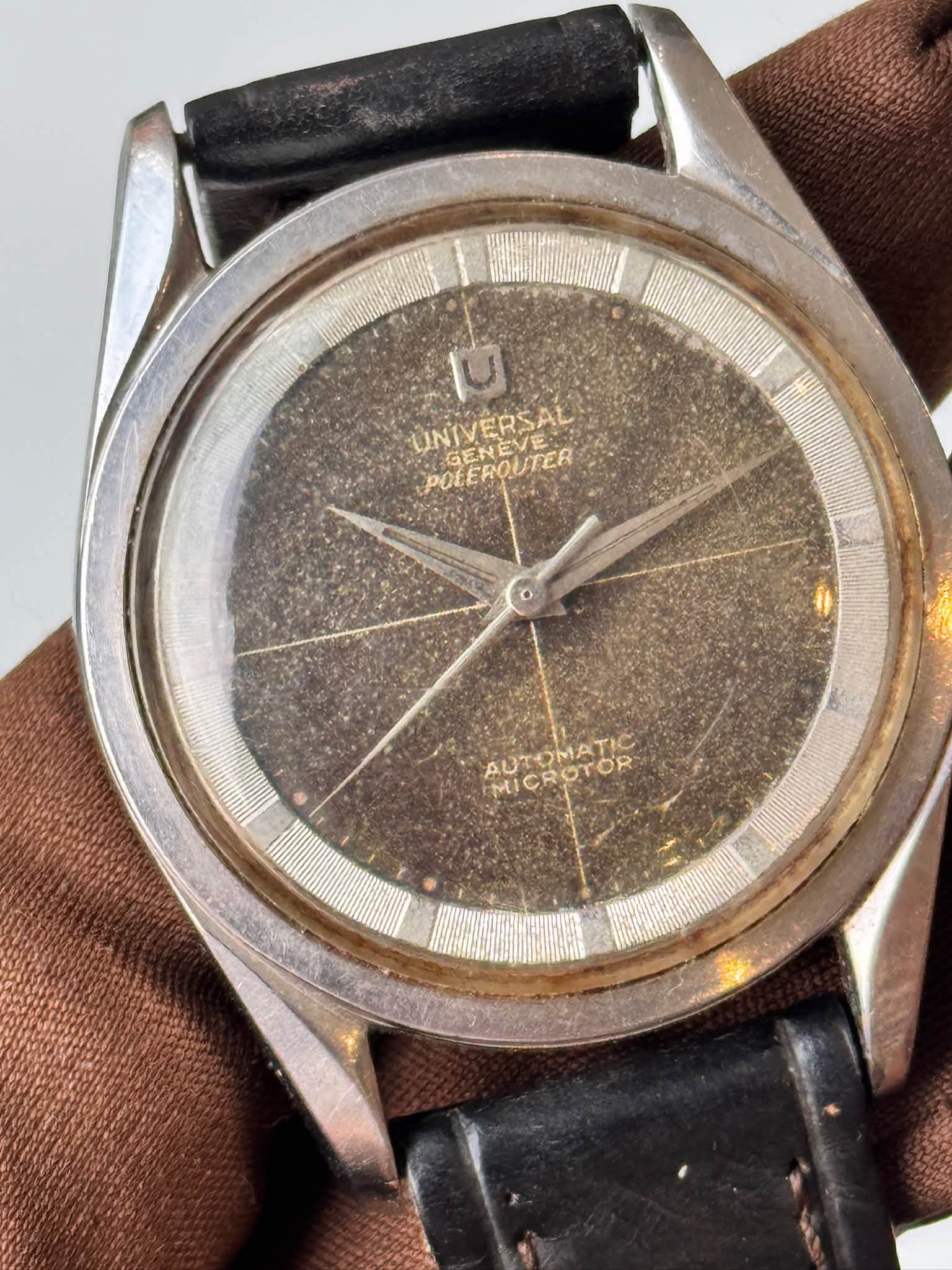 May be an image of wrist watch and text
