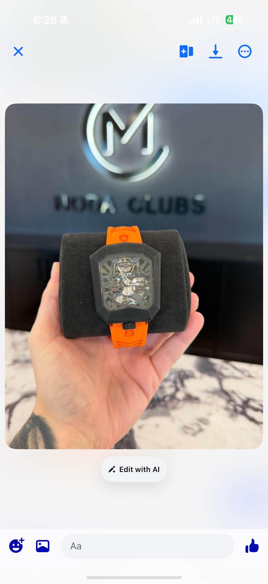 May be an image of wrist watch, phone, lighter and text