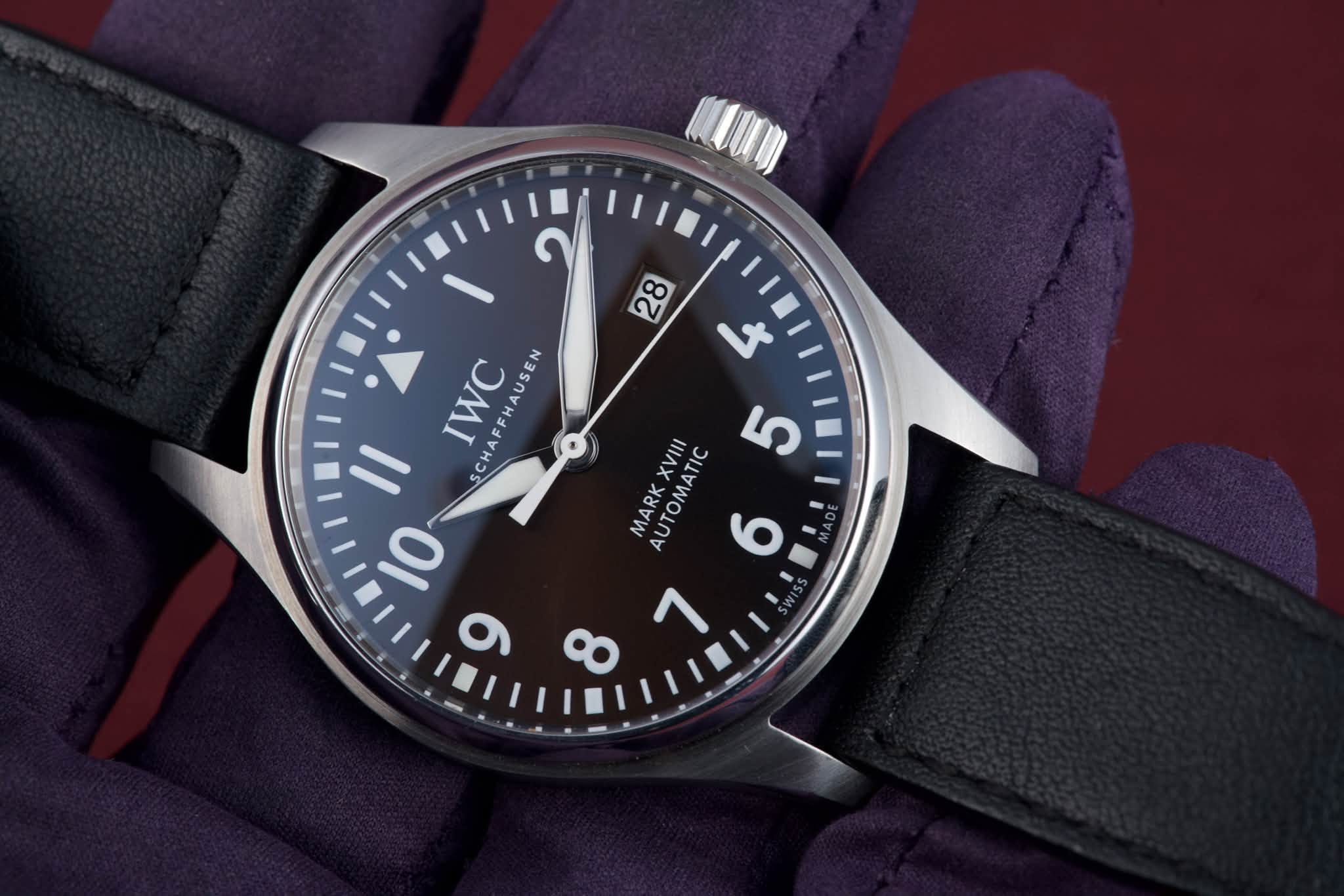 May be an image of wrist watch and text