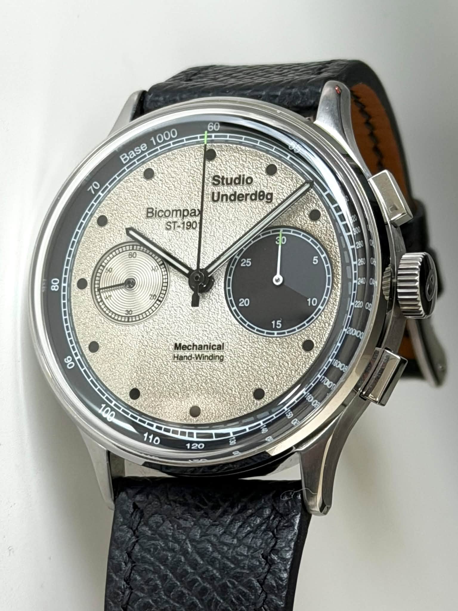 May be an image of wrist watch and text