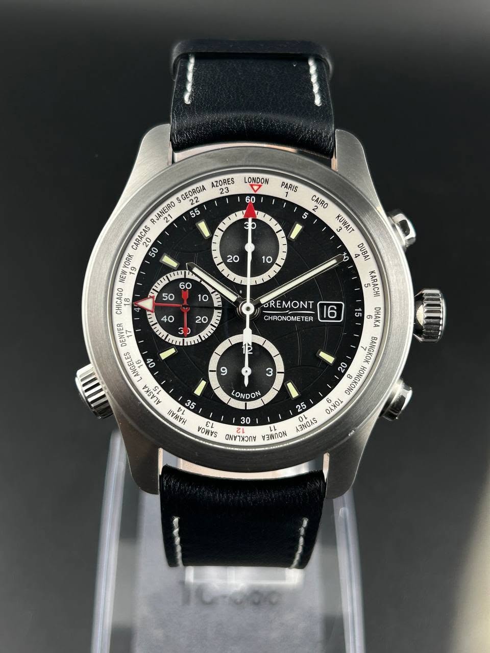 May be an image of wrist watch and text