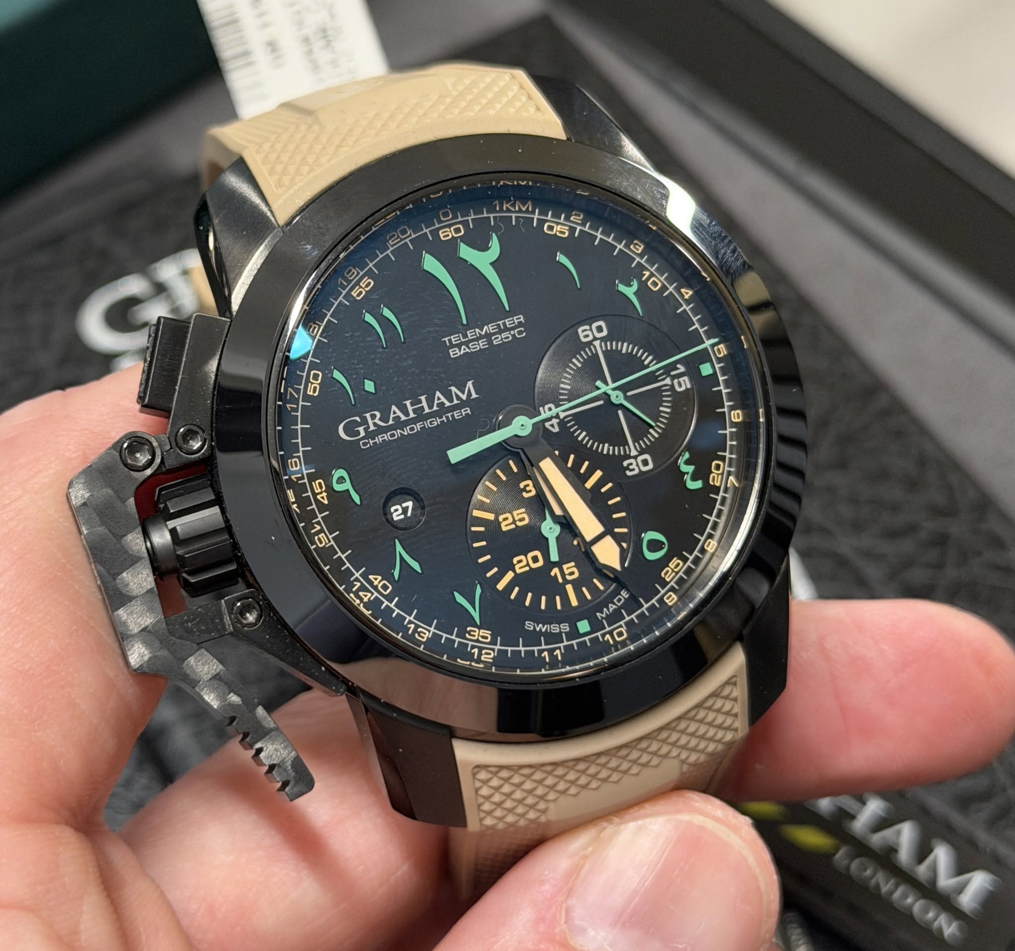 May be an image of wrist watch and text