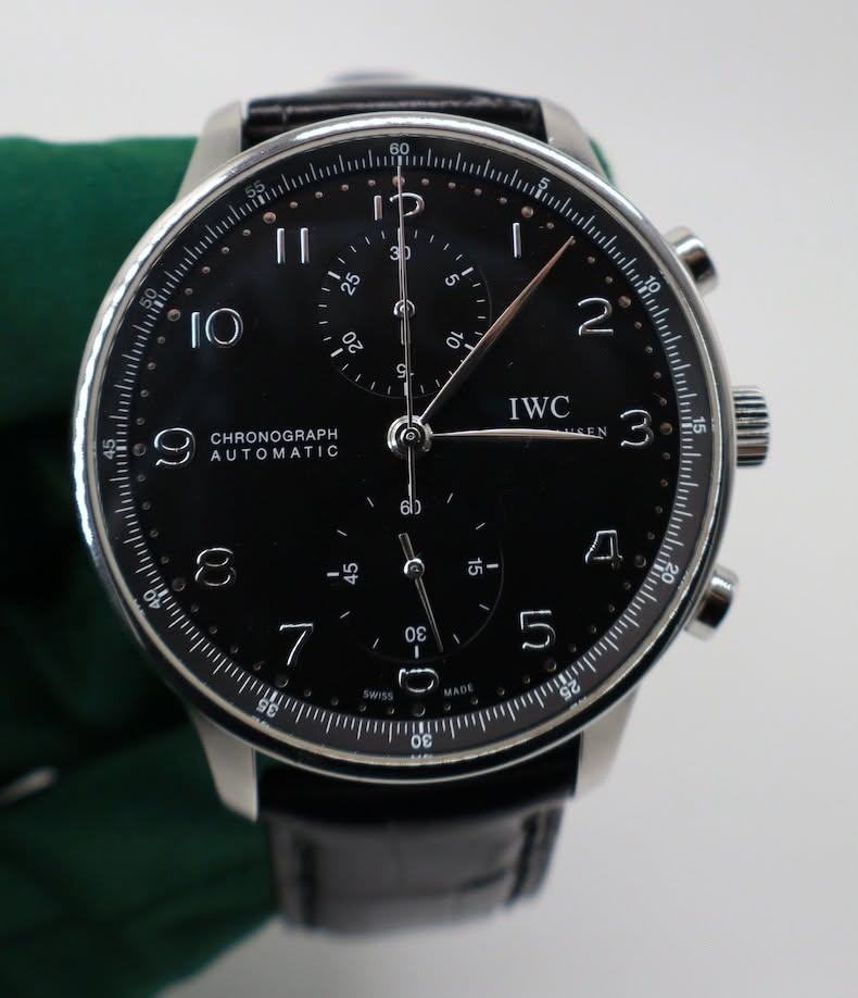 May be an image of wrist watch and text
