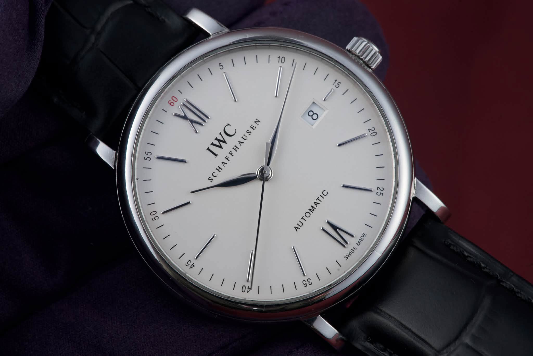 May be an image of wrist watch and text