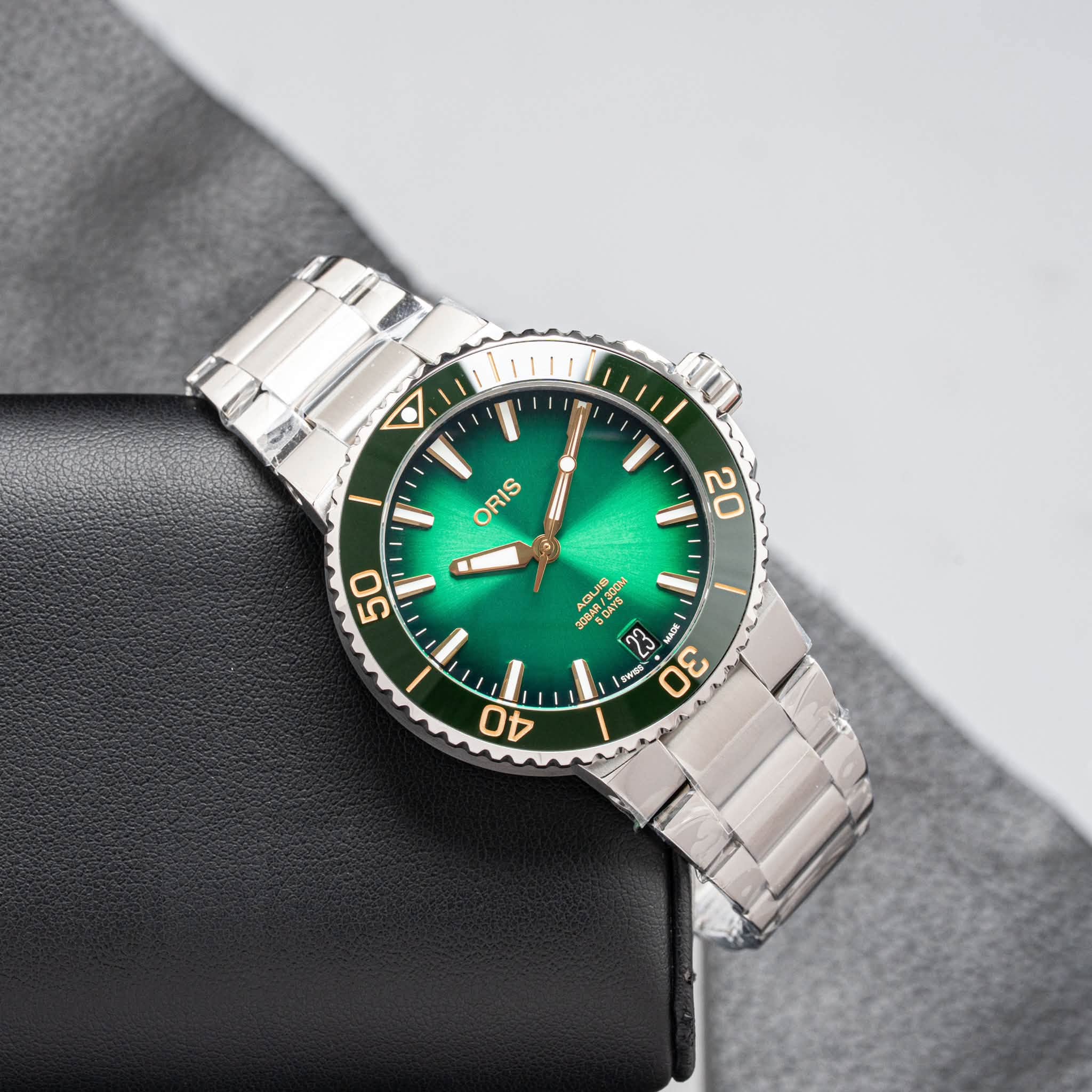 May be an image of wrist watch and text