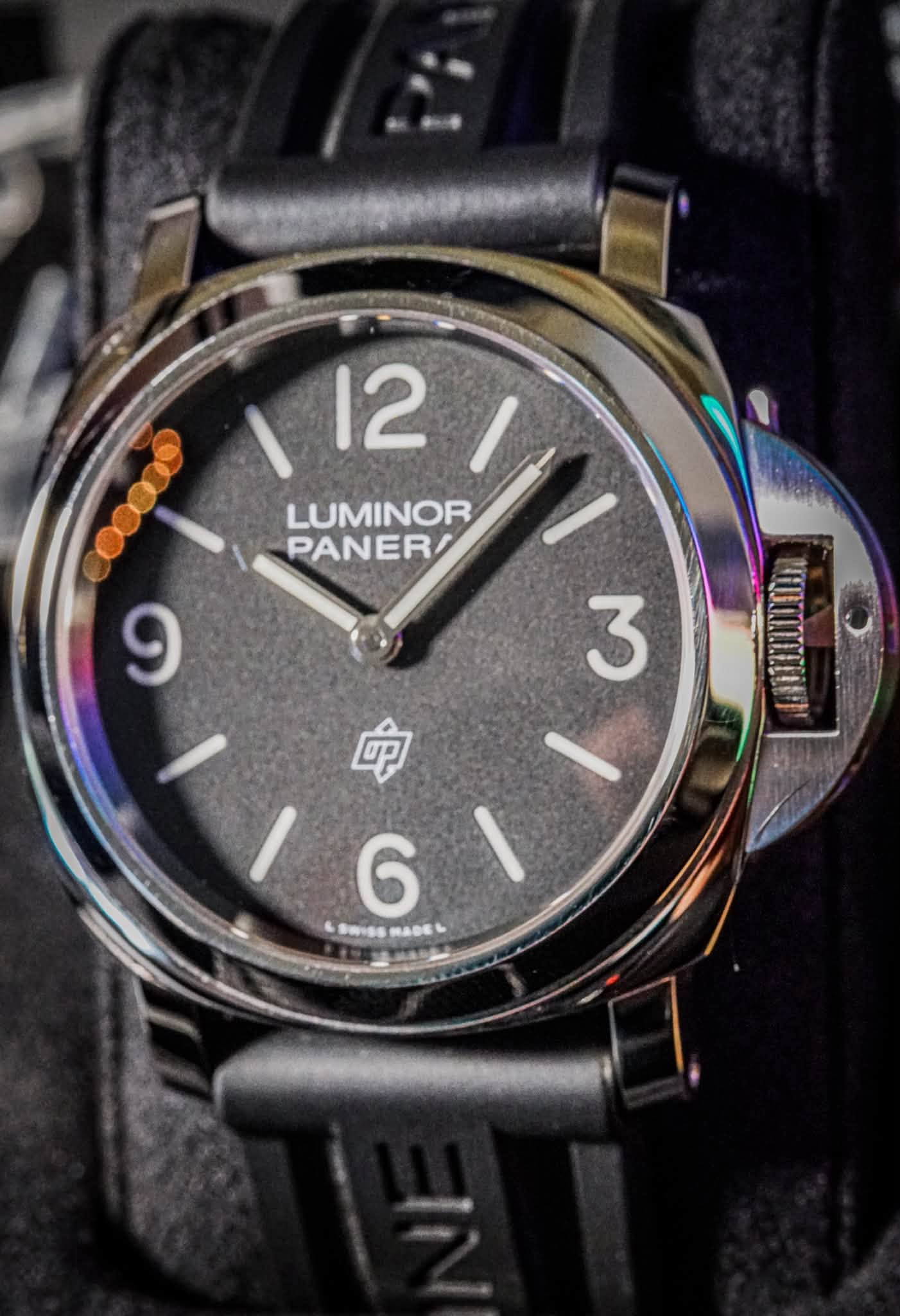 May be an image of wrist watch and text