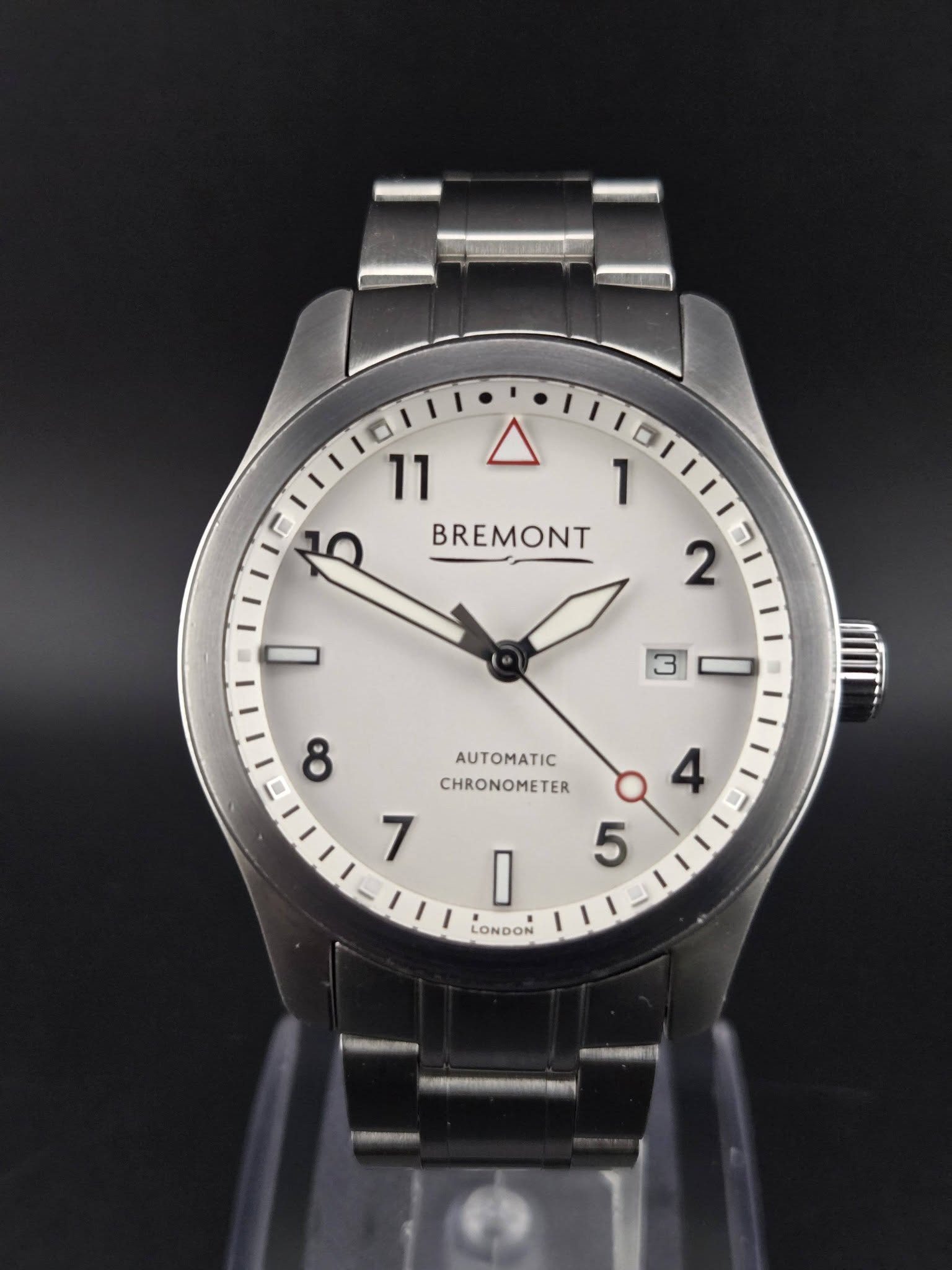 May be an image of wrist watch and text