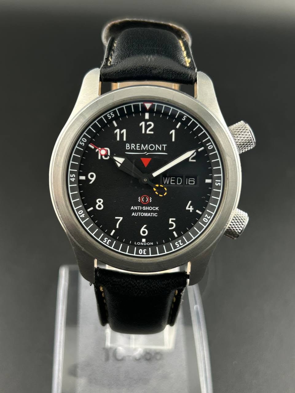 May be an image of wrist watch and text