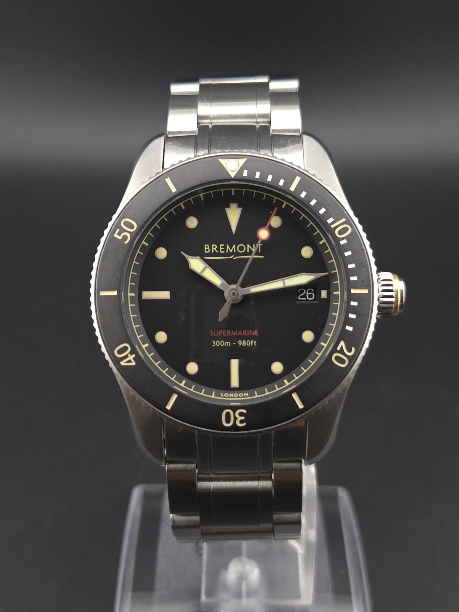 May be an image of wrist watch and text