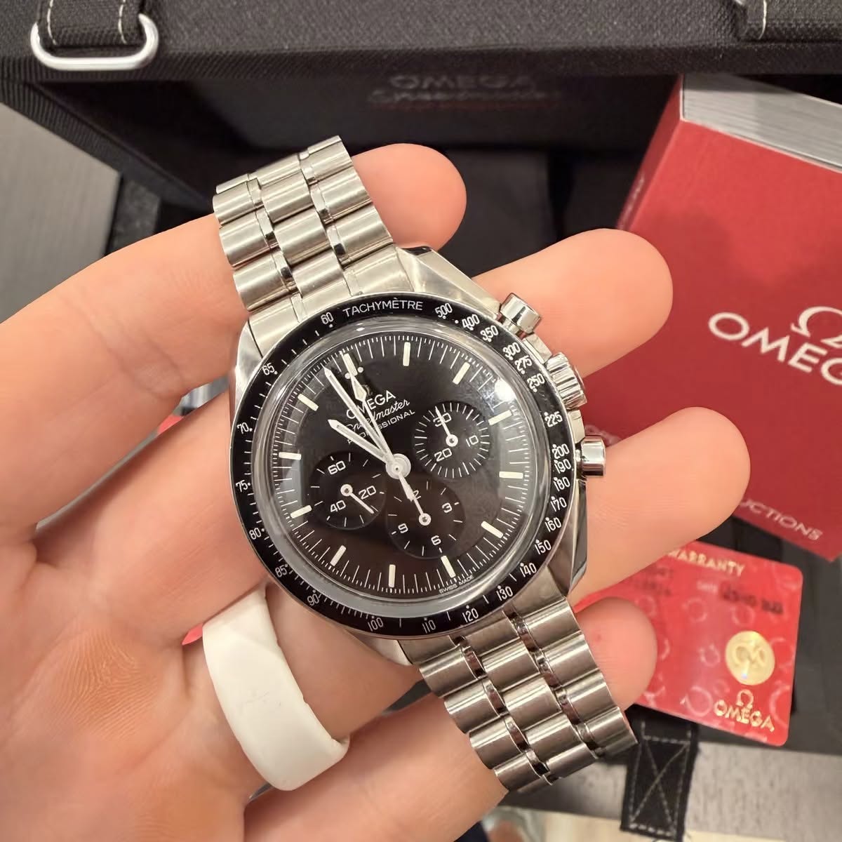 May be an image of wrist watch and text