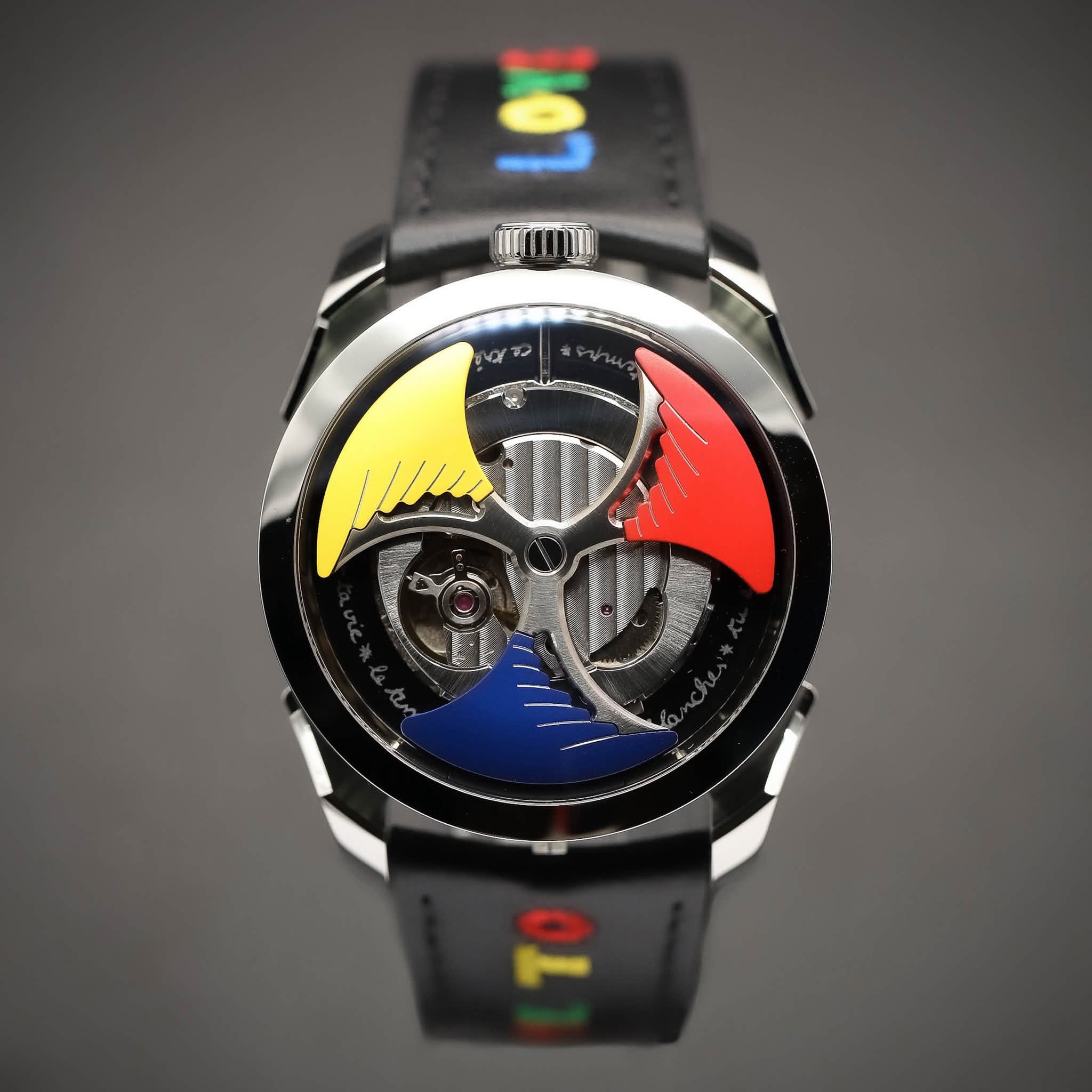May be an image of wrist watch and text