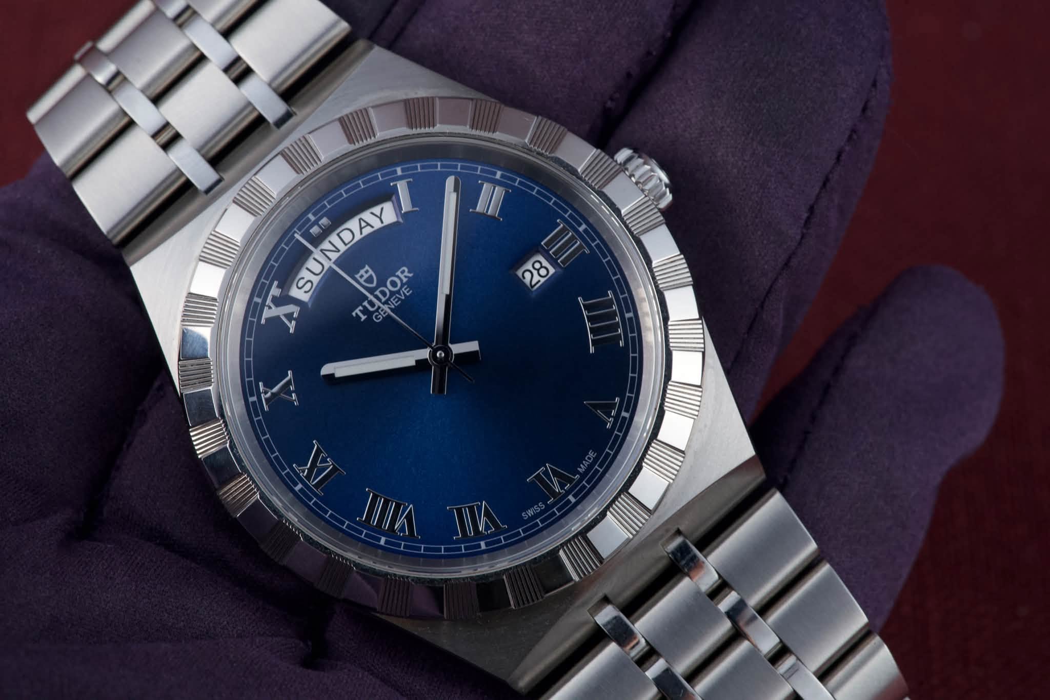 May be an image of wrist watch and text