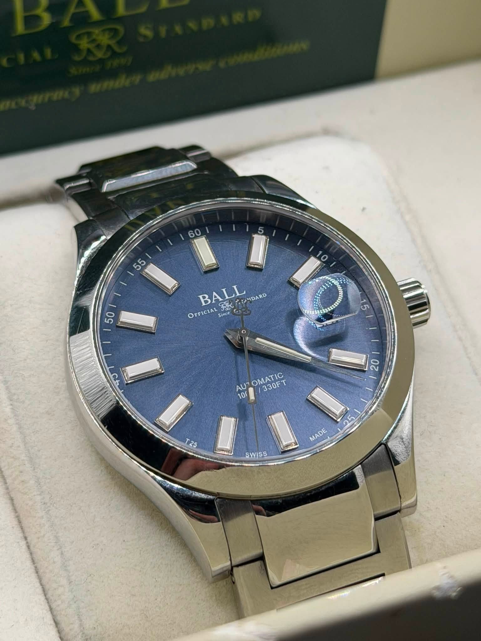 May be an image of wrist watch and text