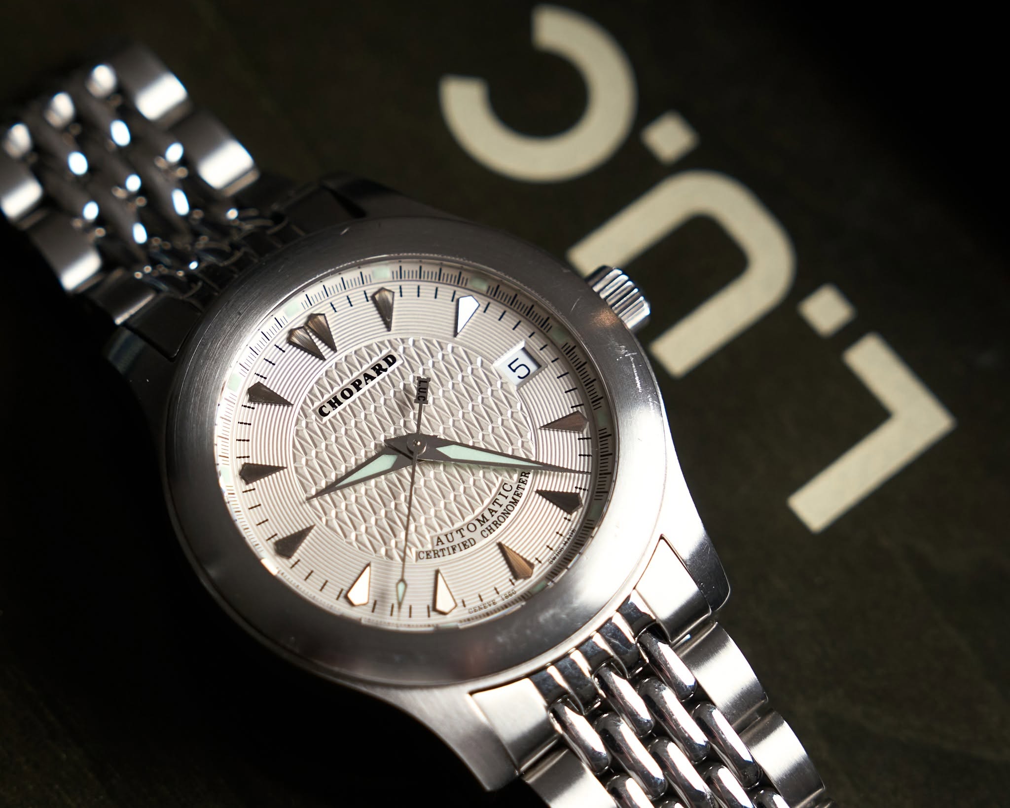 May be an image of wrist watch and text