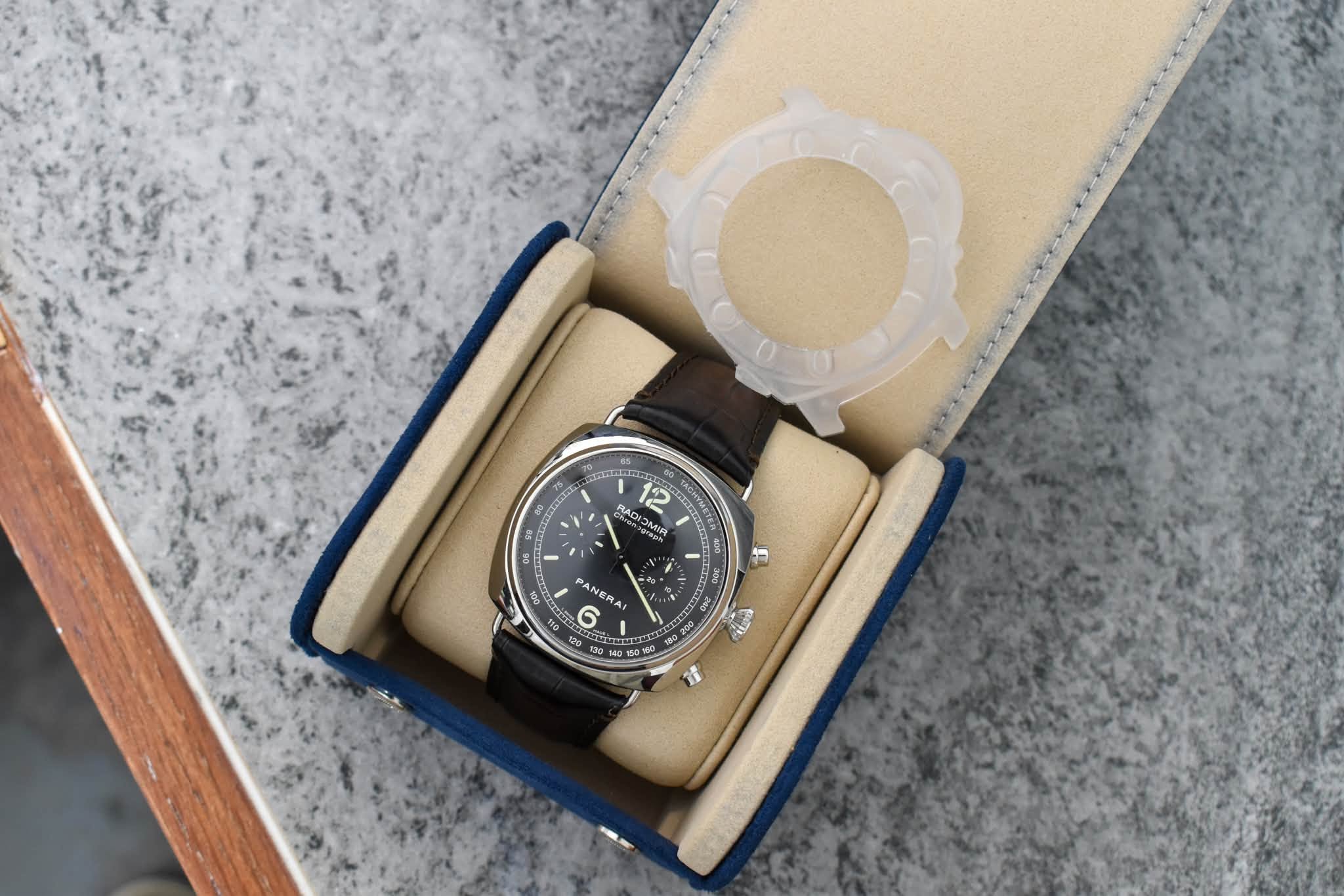 May be an image of wrist watch and text