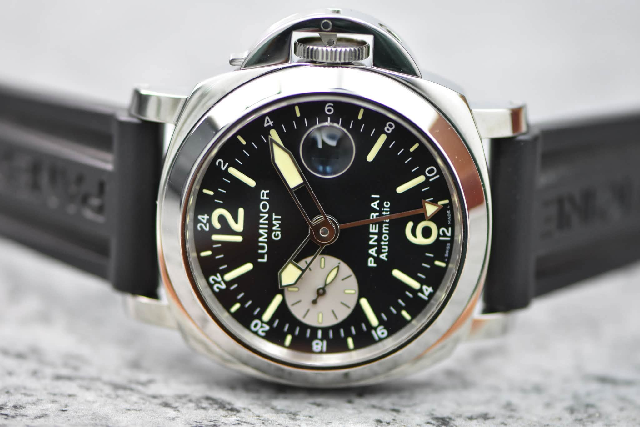 May be an image of wrist watch and text