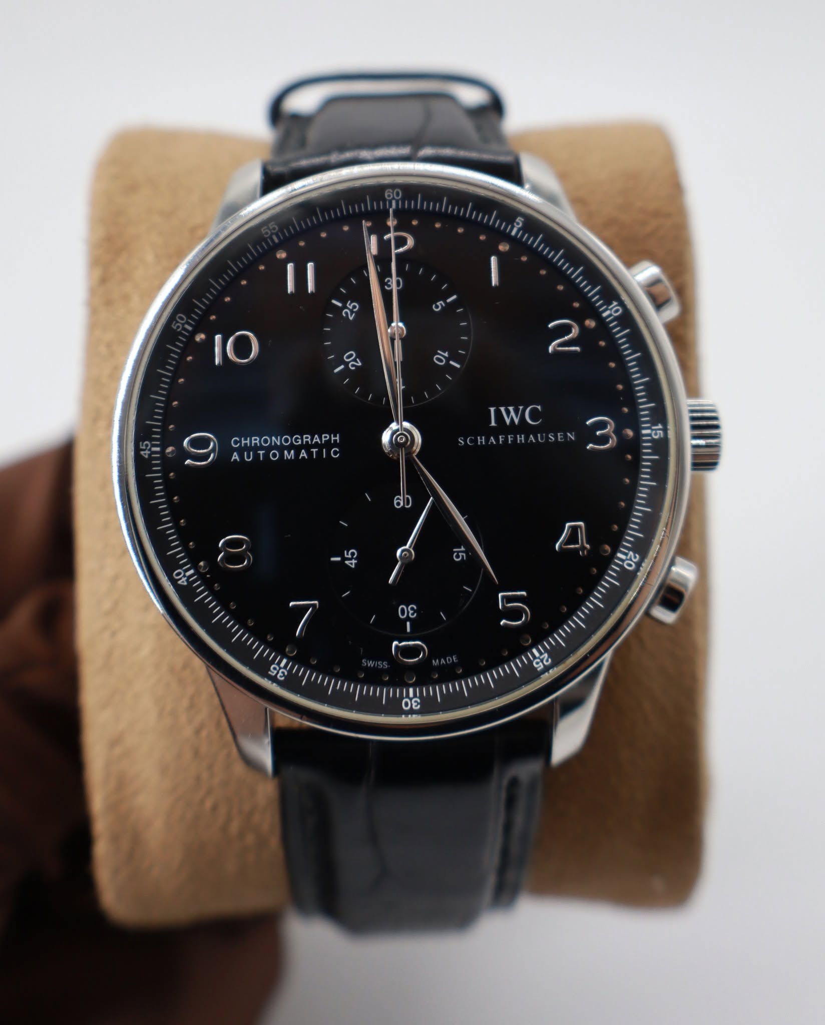 May be an image of wrist watch and text
