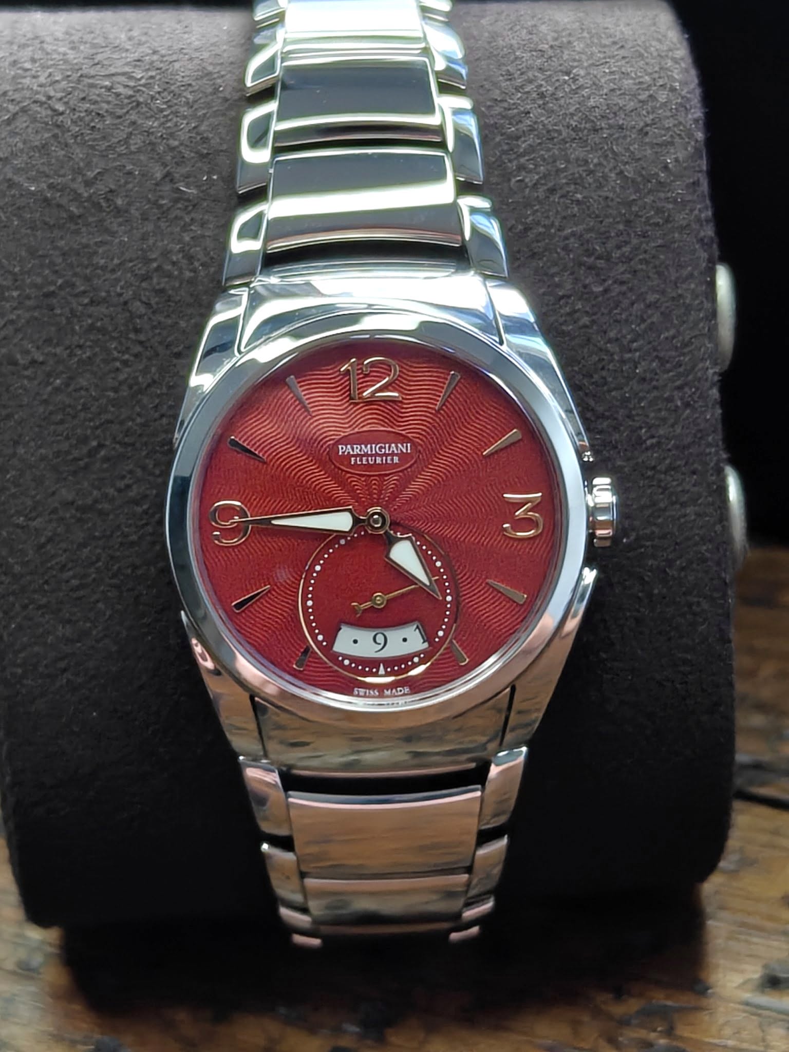 May be an image of wrist watch and text