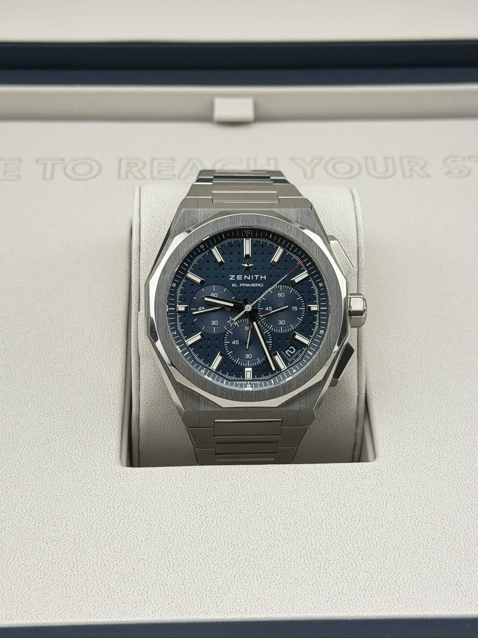 May be an image of wrist watch and text