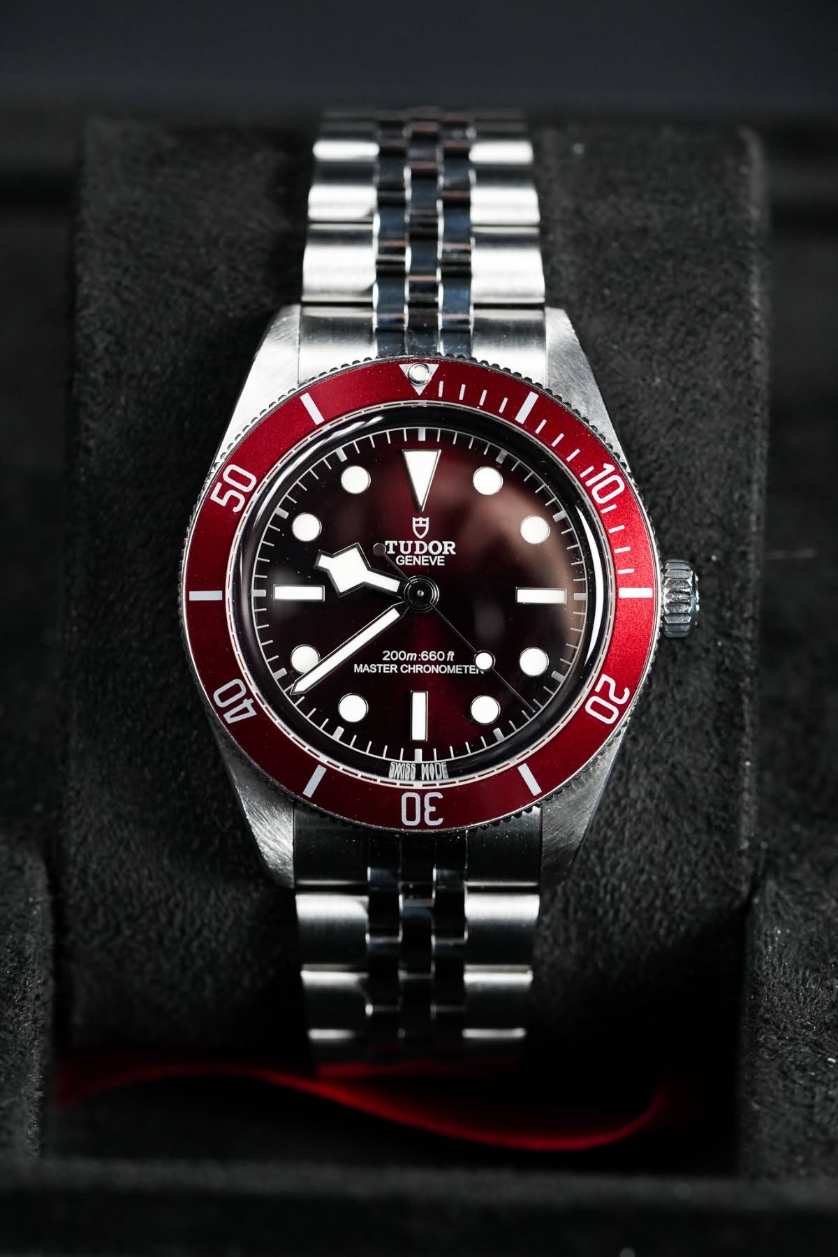 May be an image of wrist watch and text