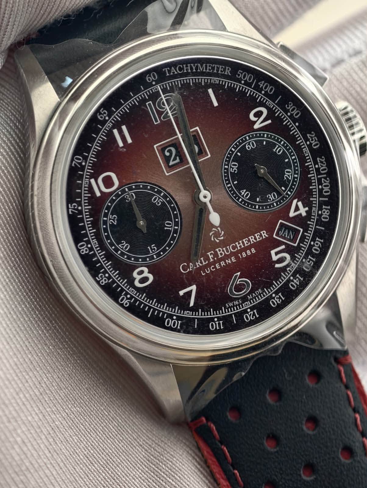 May be an image of wrist watch and text