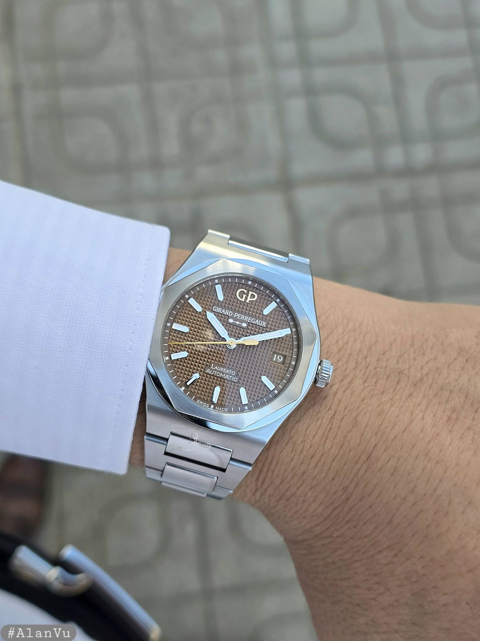 May be an image of wrist watch and text