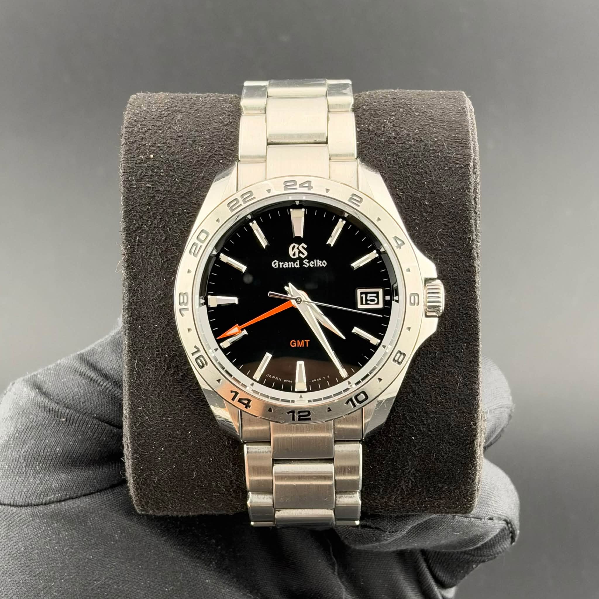 May be an image of wrist watch and text