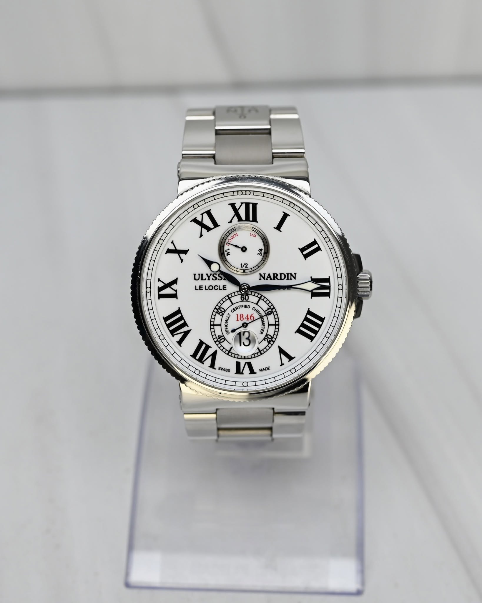 May be an image of wrist watch and text