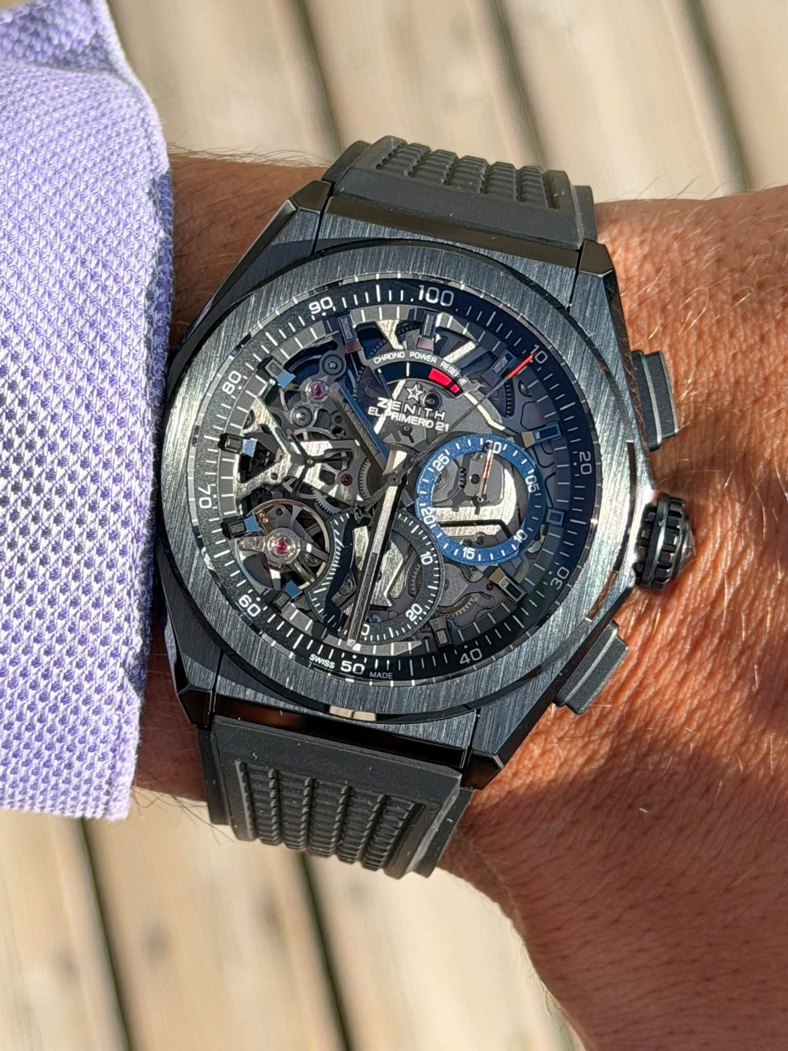 May be an image of wrist watch and text