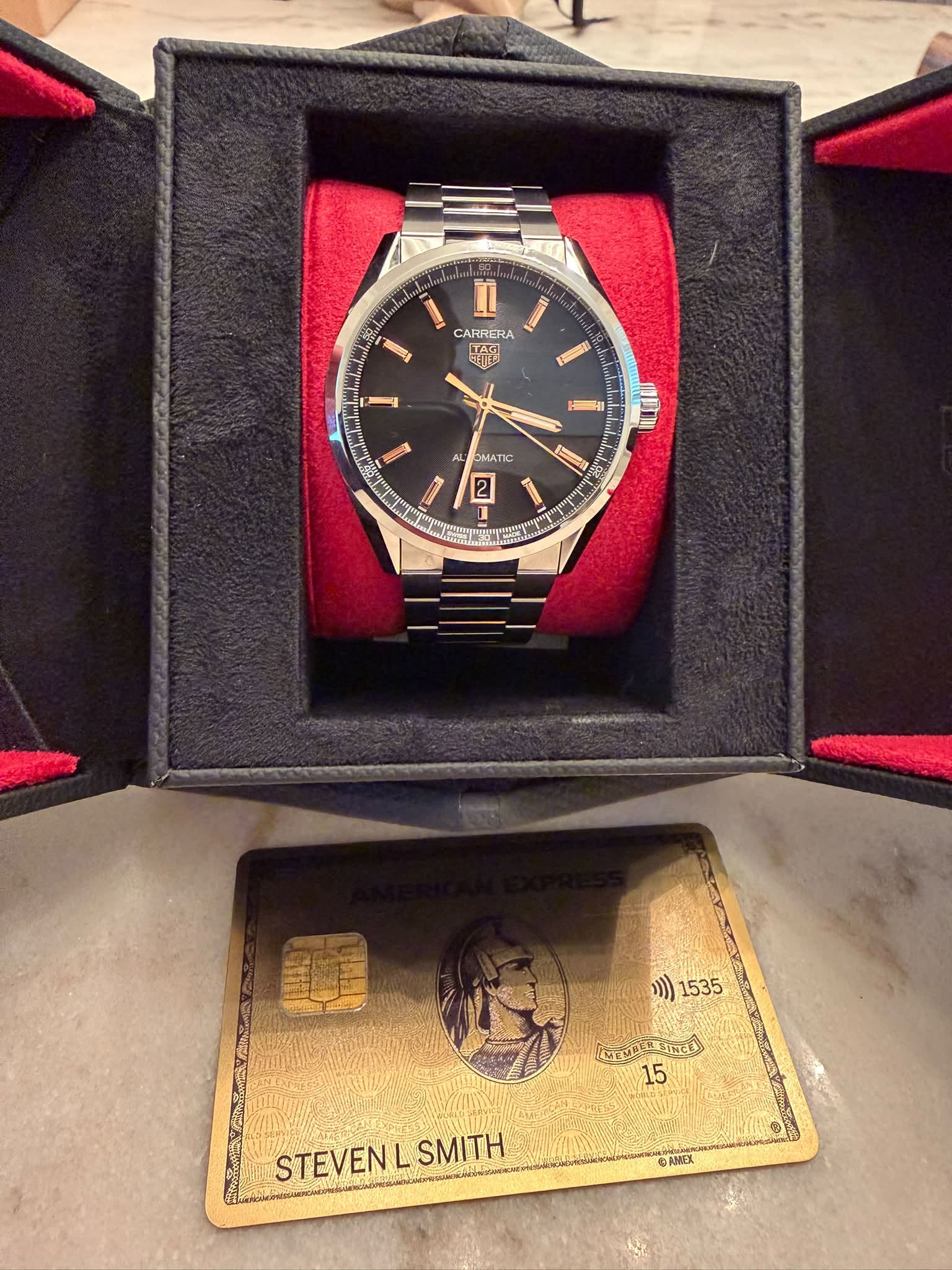 May be an image of wrist watch and text