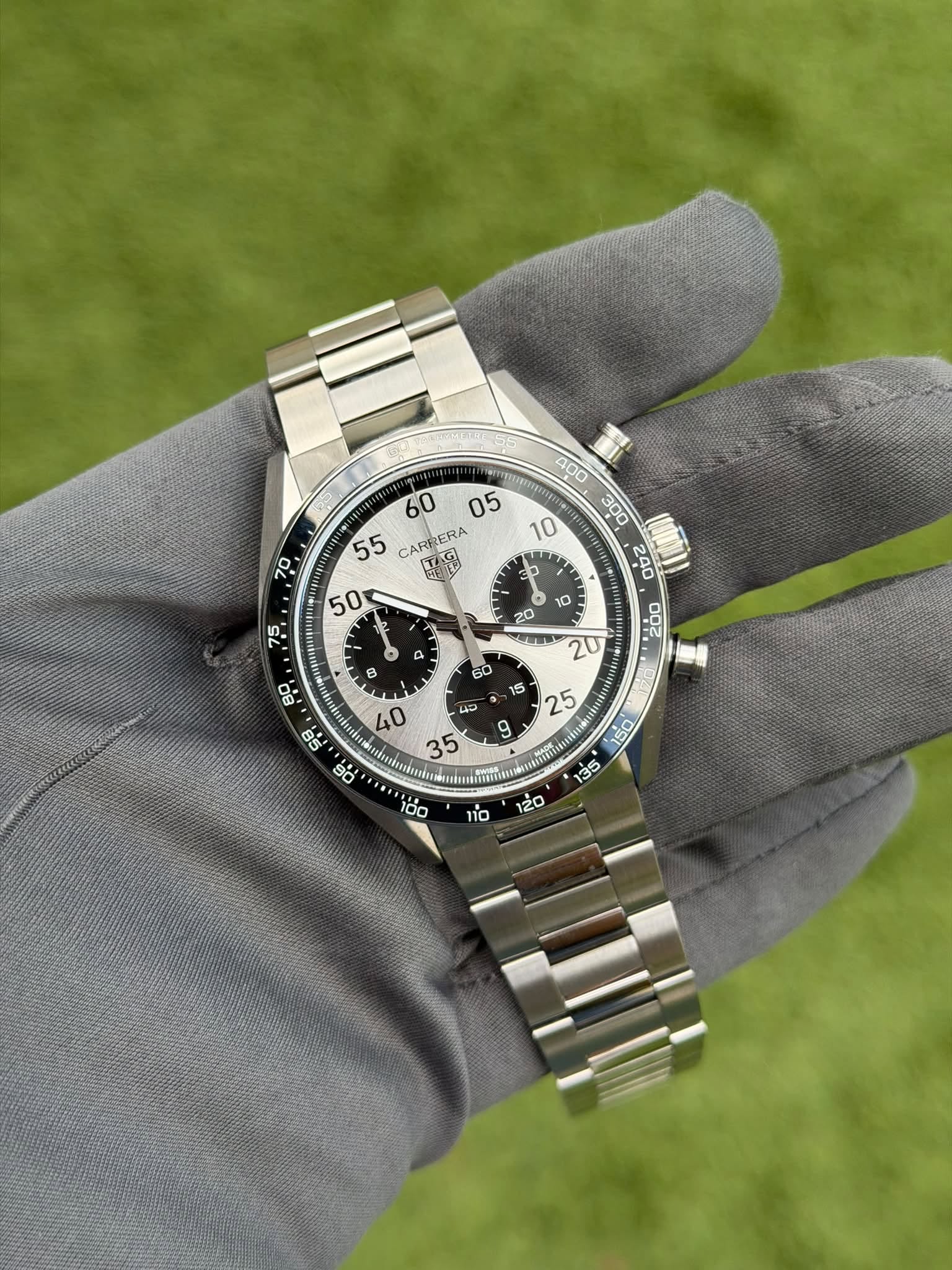 May be an image of wrist watch and text