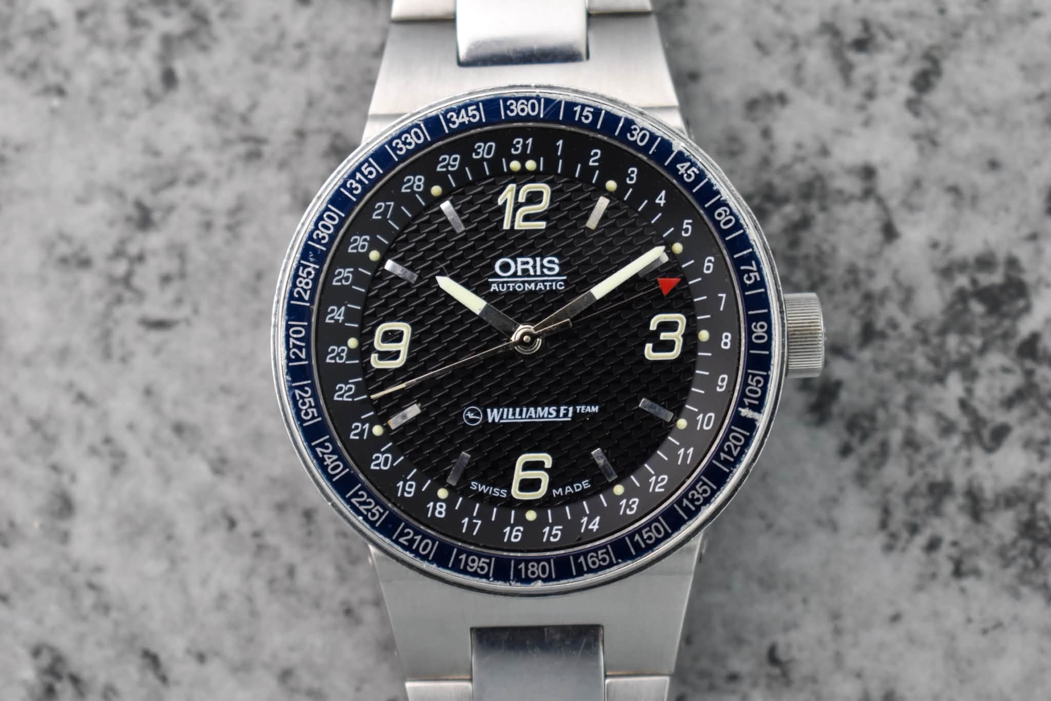 May be an image of digital watch and text