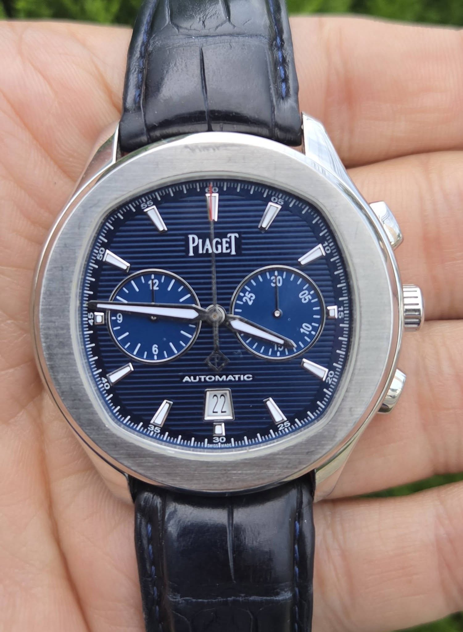 May be an image of wrist watch and text