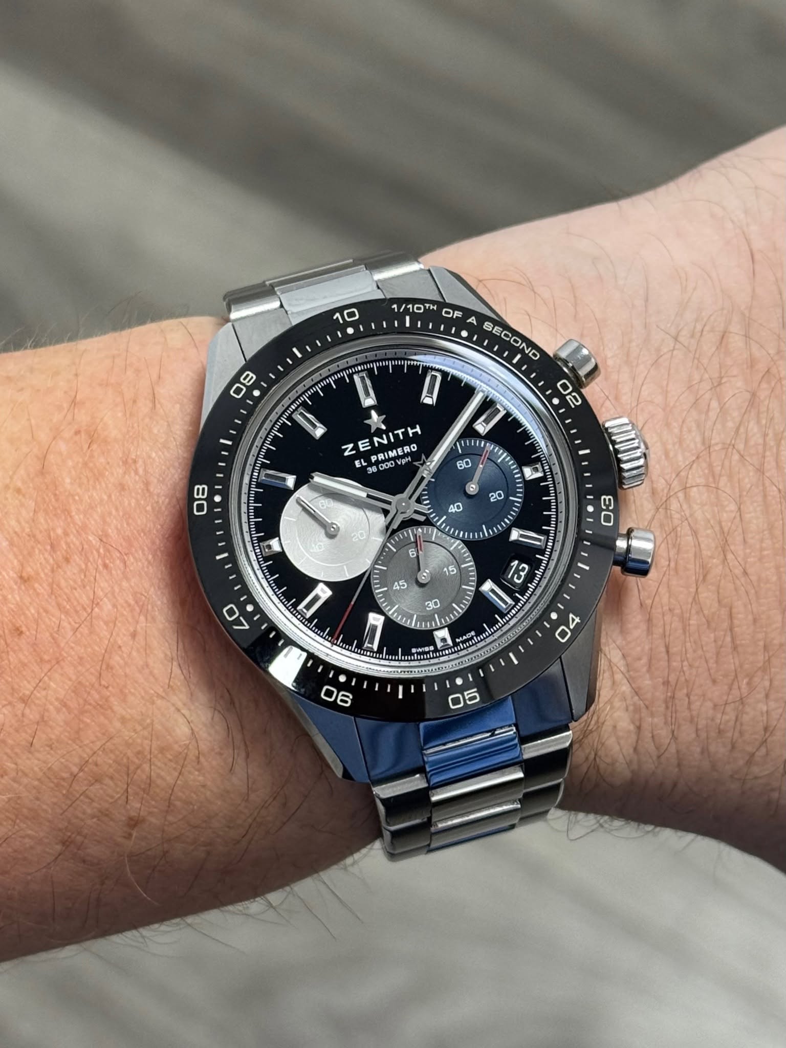 May be an image of wrist watch and text
