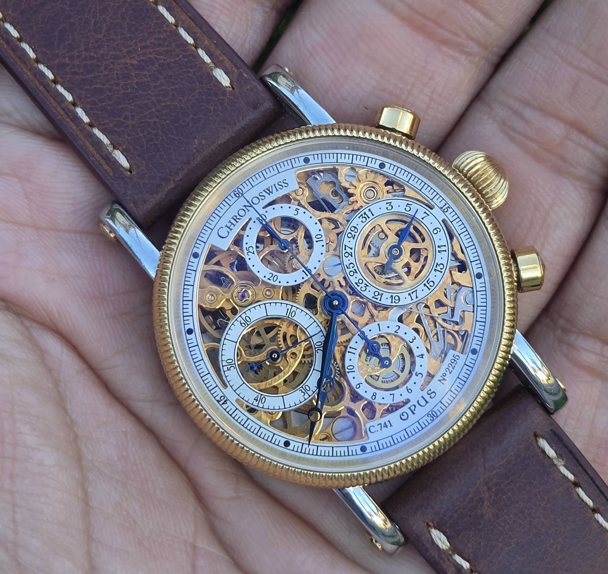 May be an image of wrist watch and text